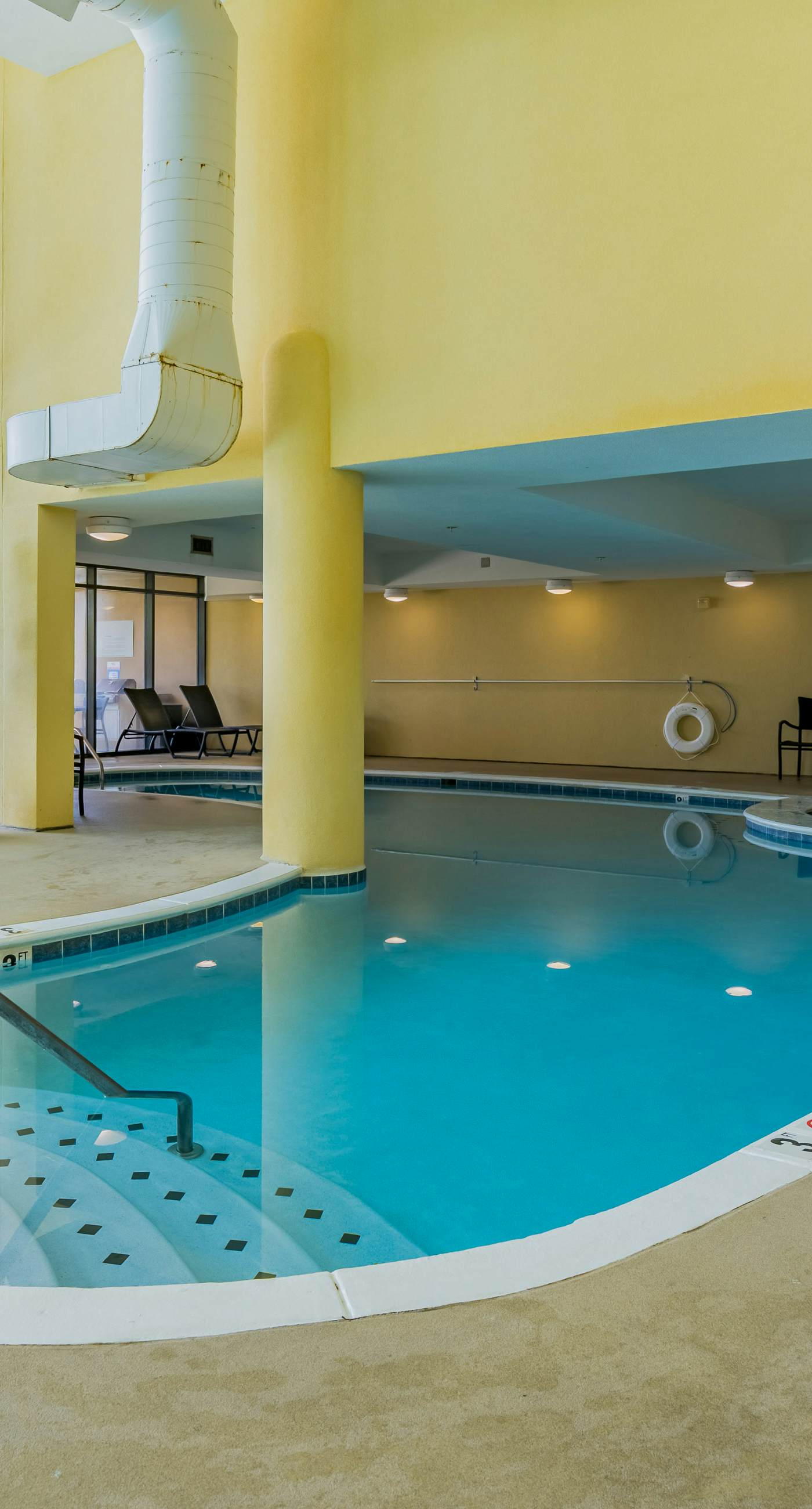 Beachfront condo with pool, hot tub, W/D, sauna, balcony, and tennis court