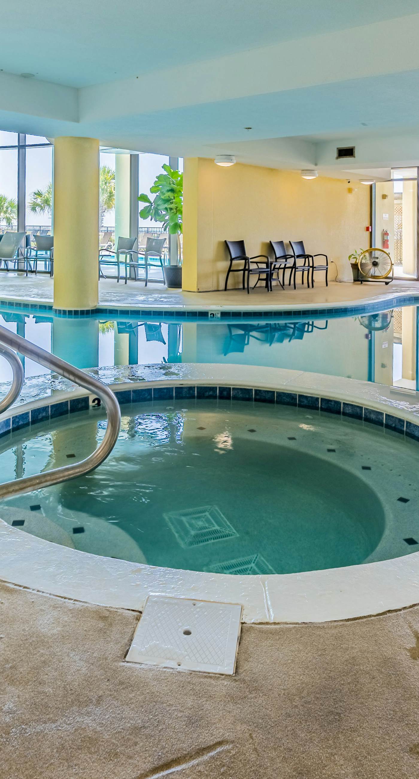 Beachfront condo with pool, hot tub, W/D, sauna, balcony, and tennis court