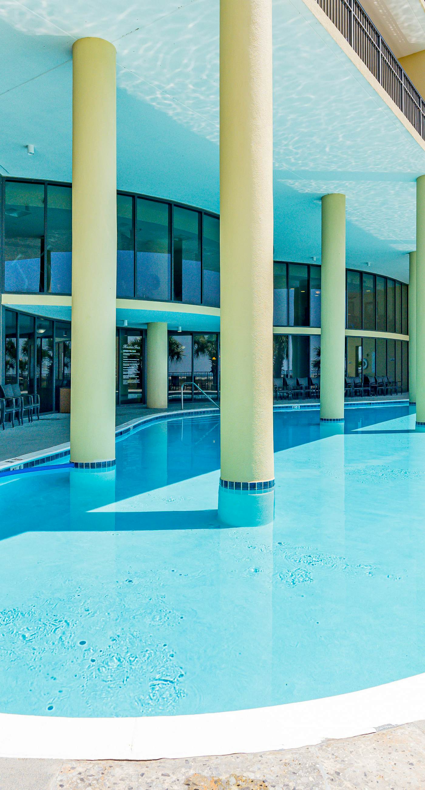 Beachfront condo with pool, hot tub, W/D, sauna, balcony, and tennis court