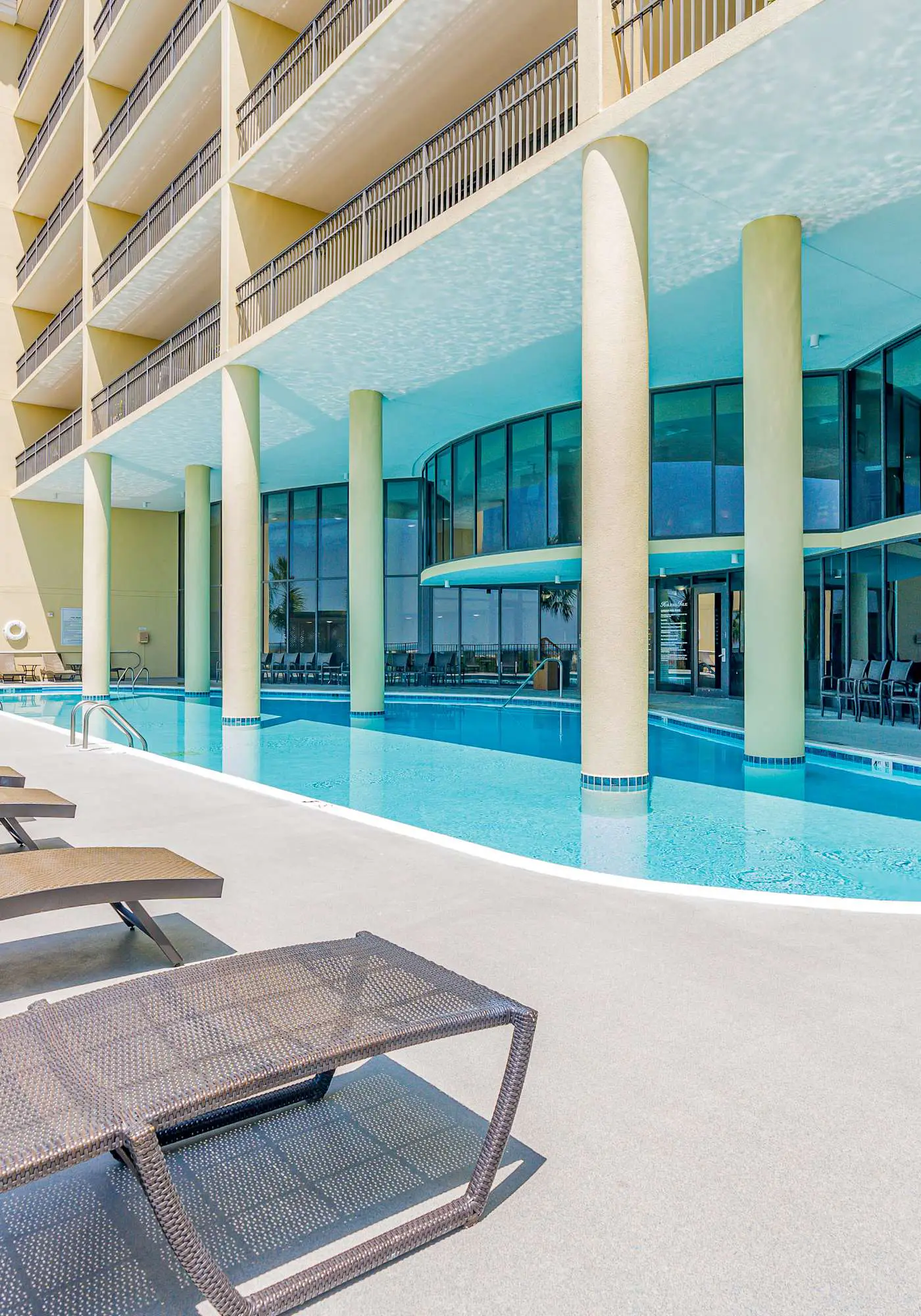 Beachfront condo with pool, hot tub, W/D, sauna, balcony, and tennis court