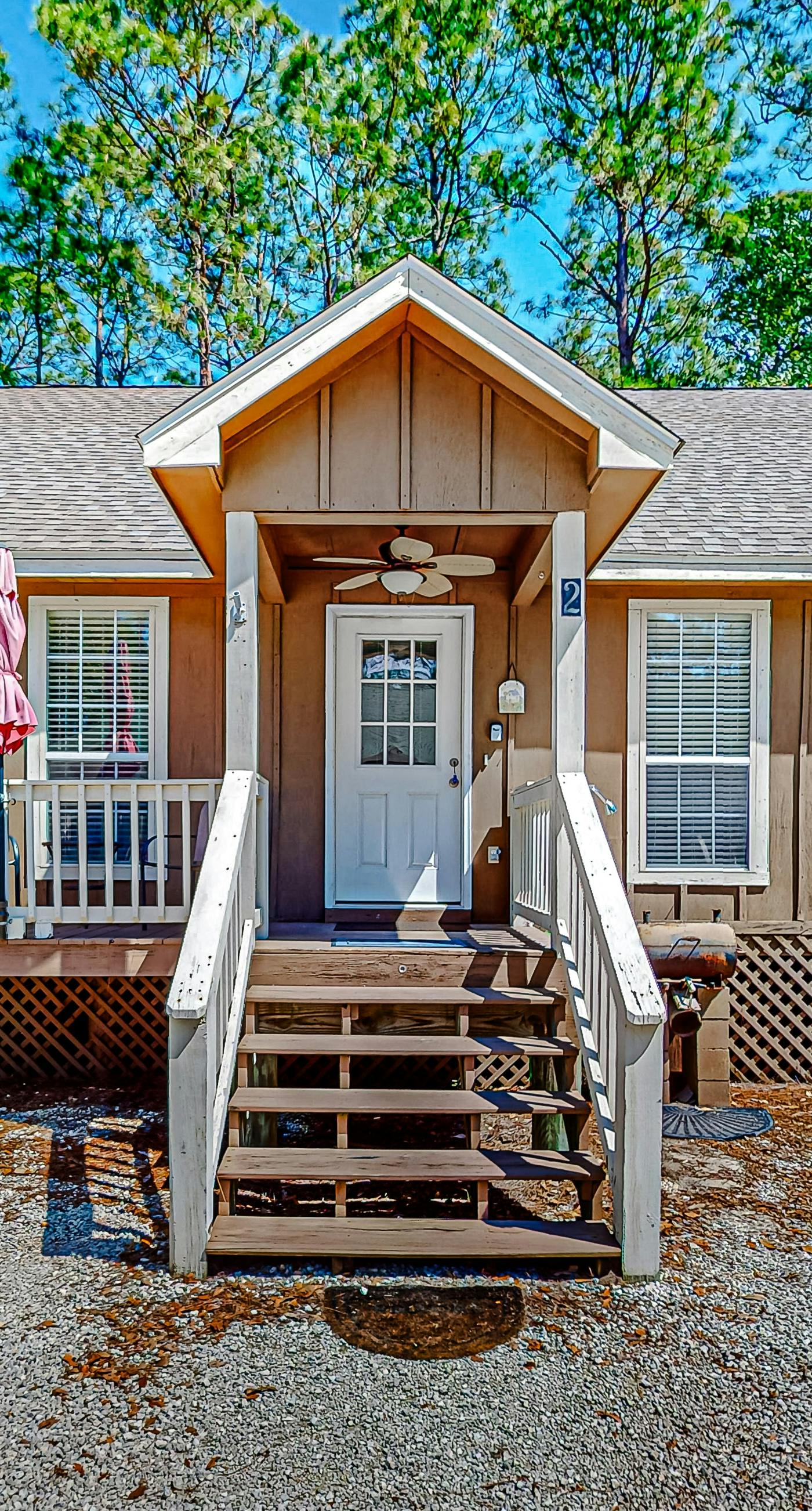 Perfectly located condo with beach access - deck, internet, W&D, & AC