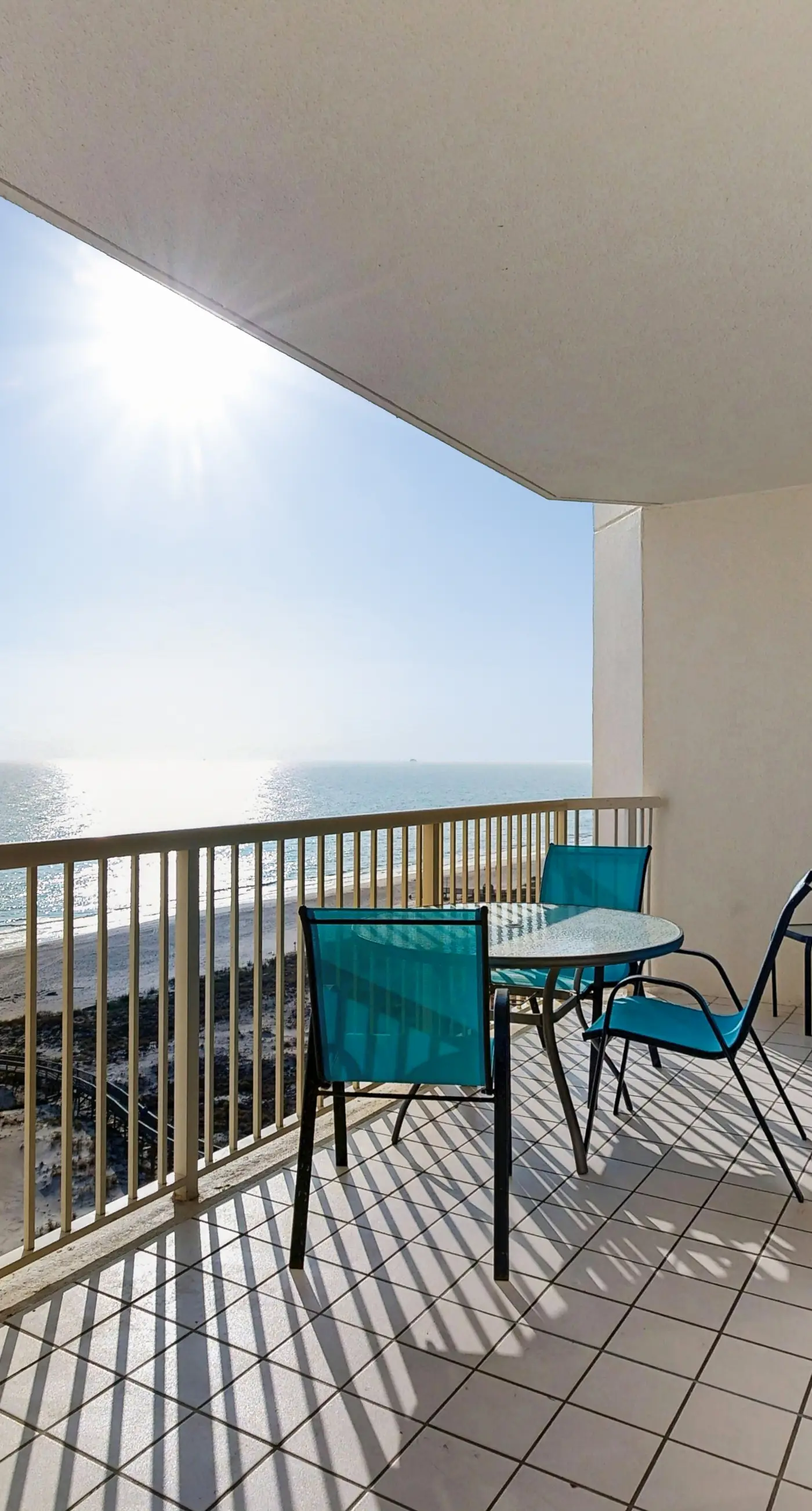 Spacious beachfront condo with full kitchen, shared pool and beach access