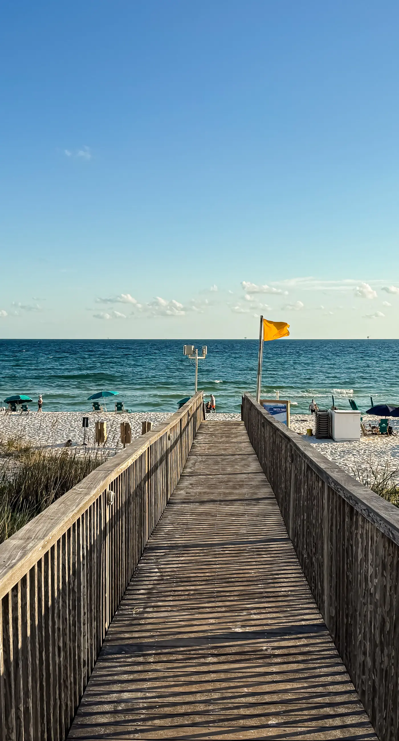 Spacious beachfront condo with full kitchen, shared pool and beach access