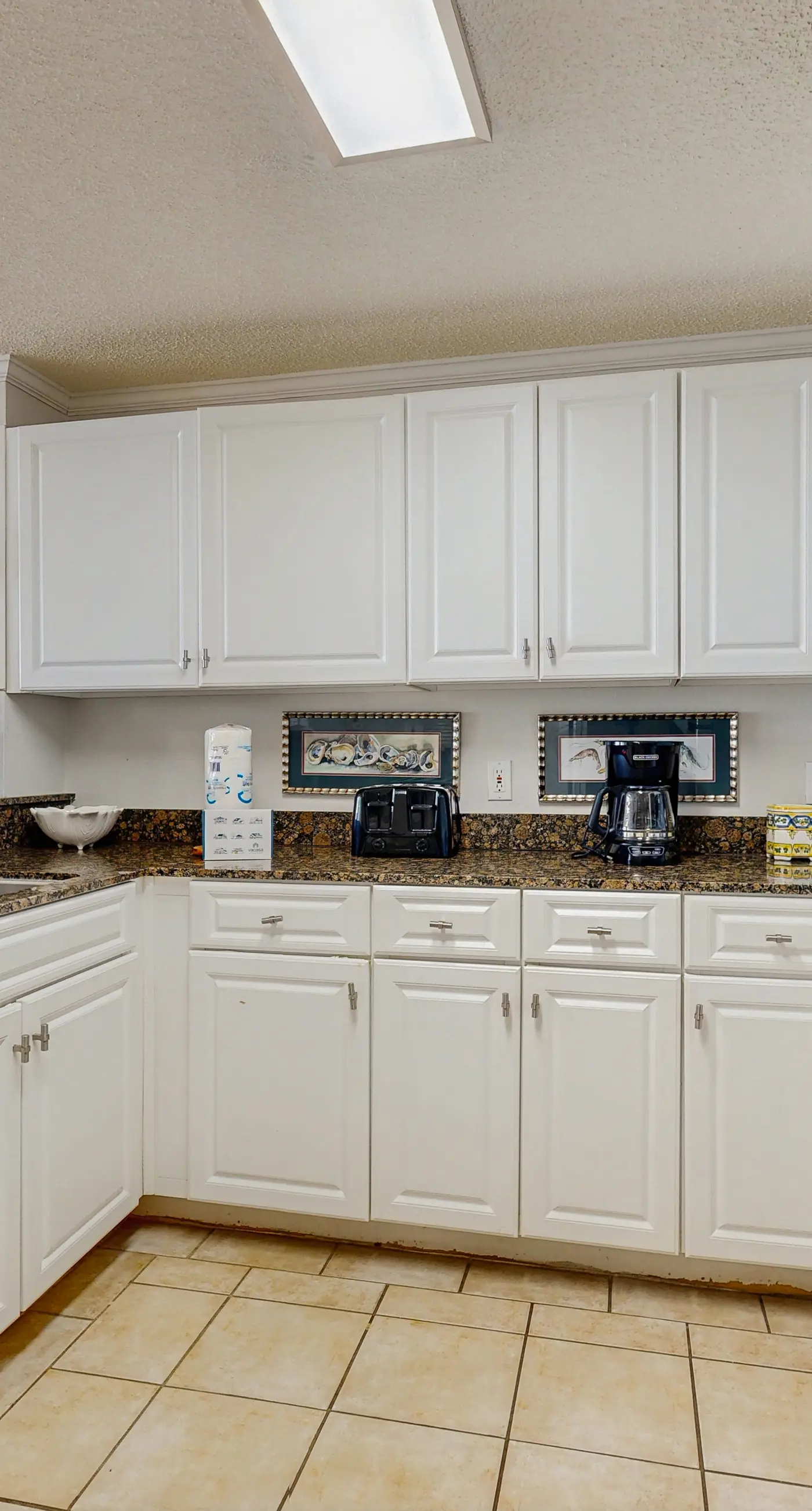 Spacious beachfront condo with full kitchen, shared pool and beach access