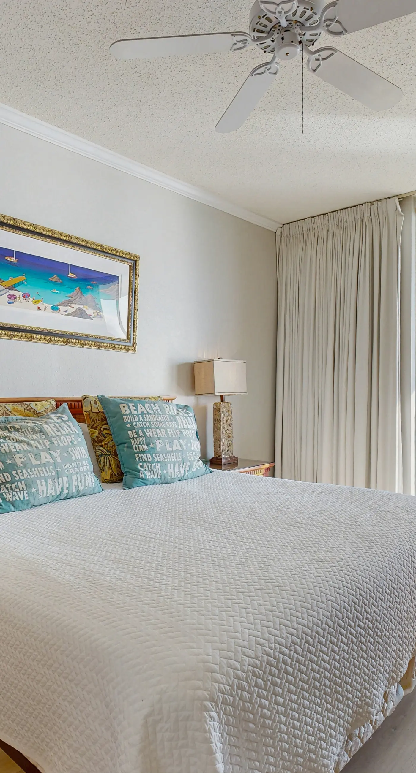 Spacious beachfront condo with full kitchen, shared pool and beach access