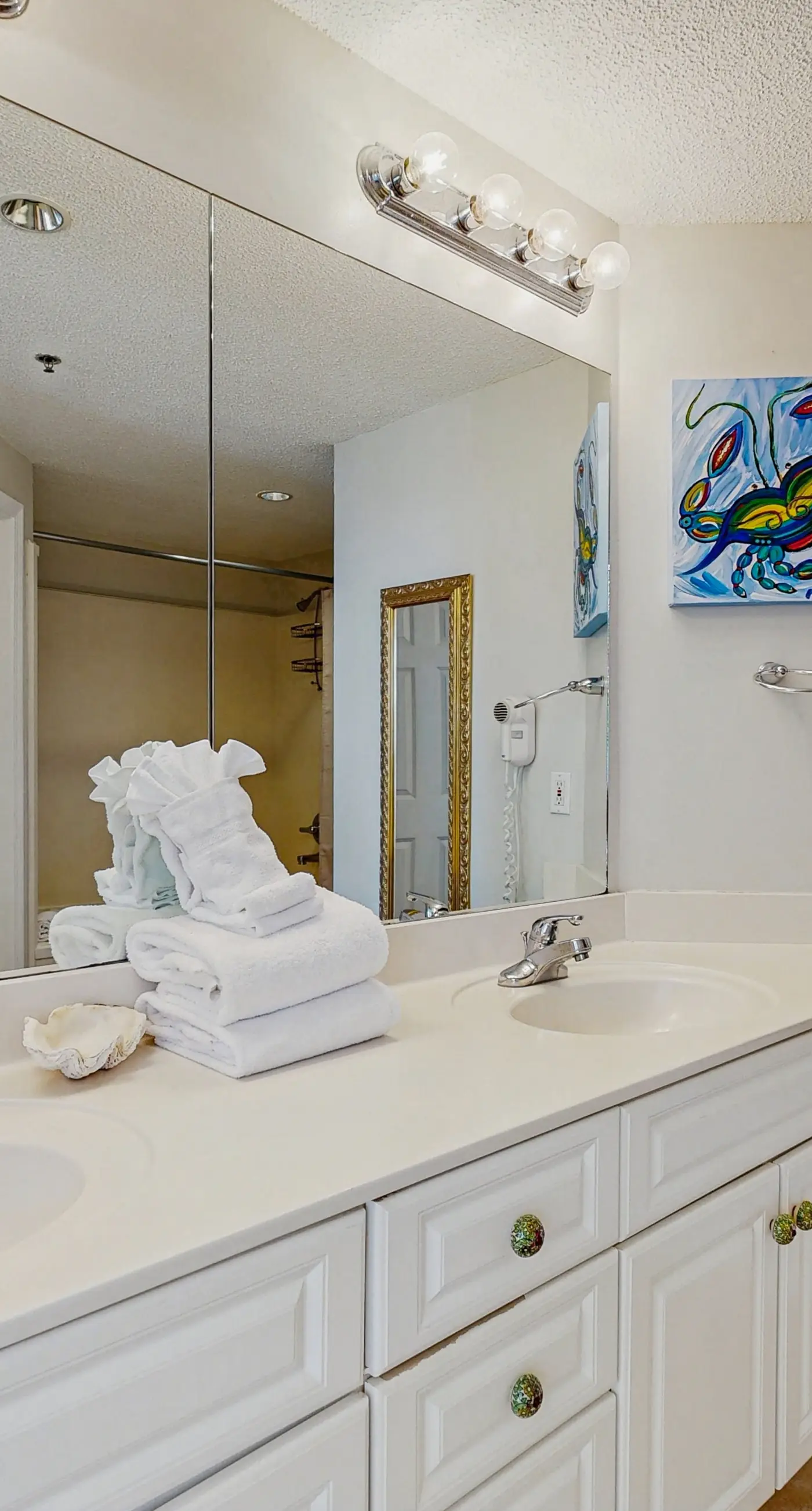 Spacious beachfront condo with full kitchen, shared pool and beach access