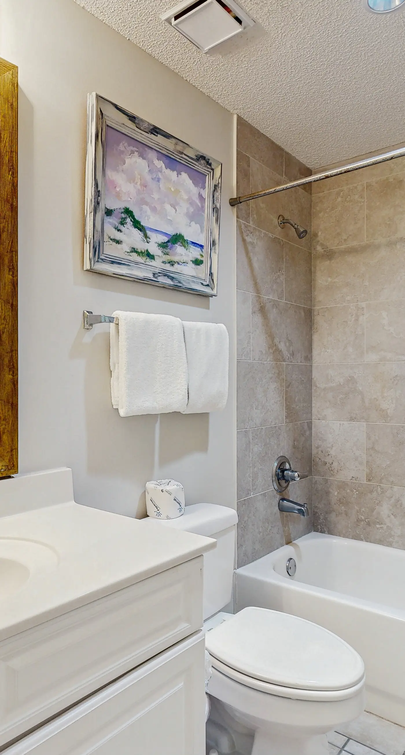 Spacious beachfront condo with full kitchen, shared pool and beach access