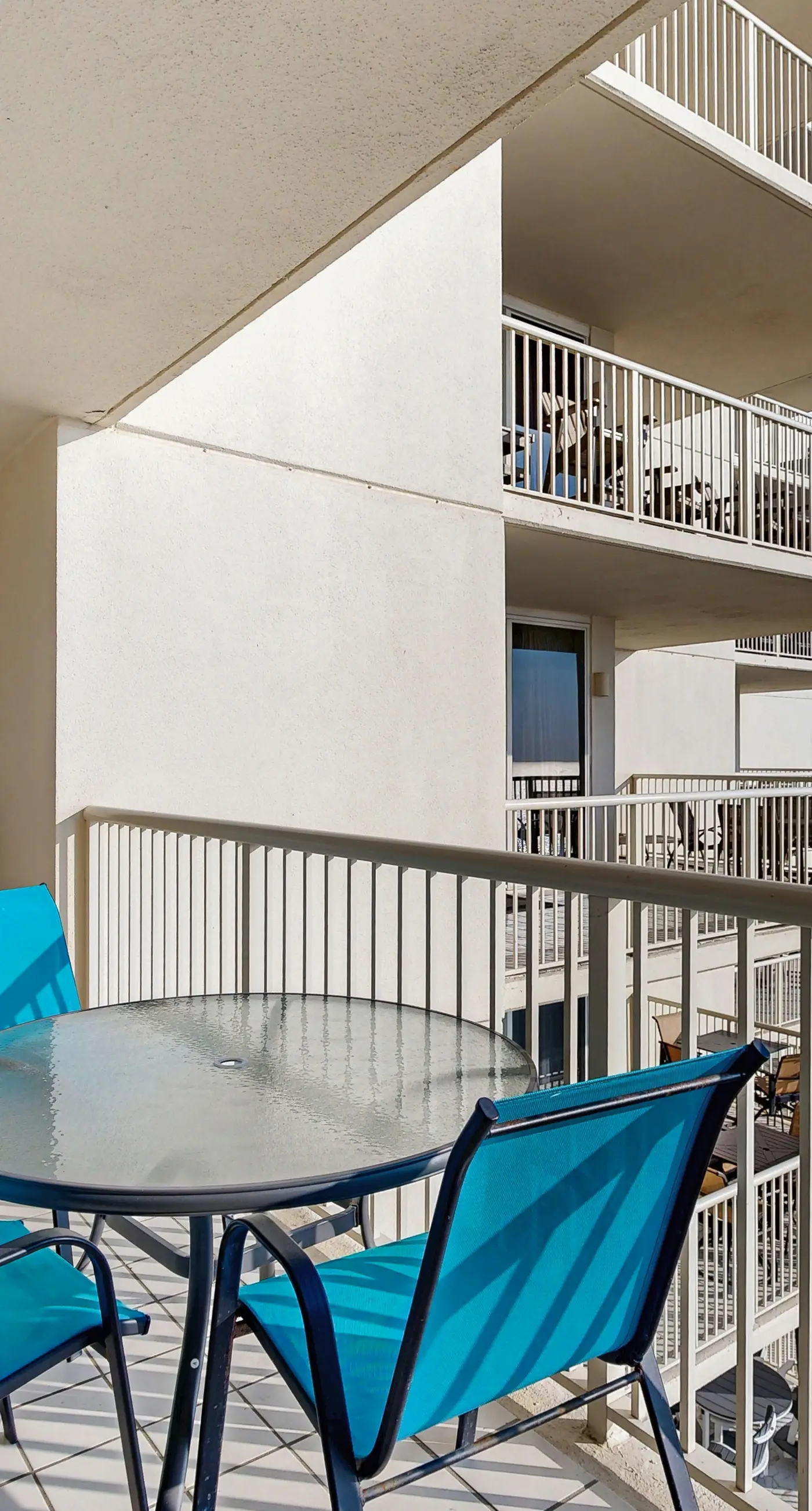 Spacious beachfront condo with full kitchen, shared pool and beach access