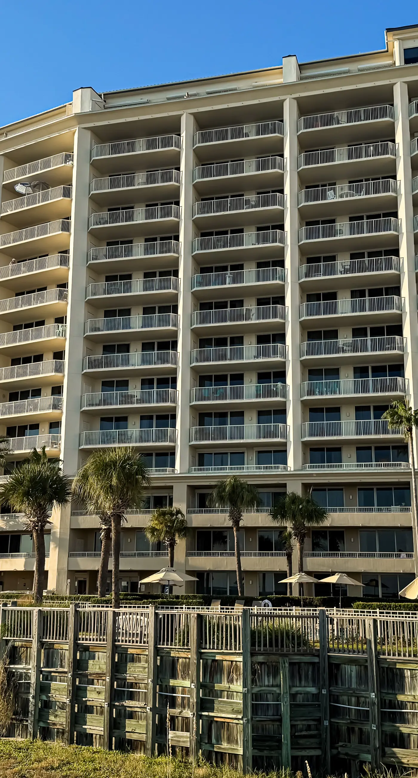 Spacious beachfront condo with full kitchen, shared pool and beach access