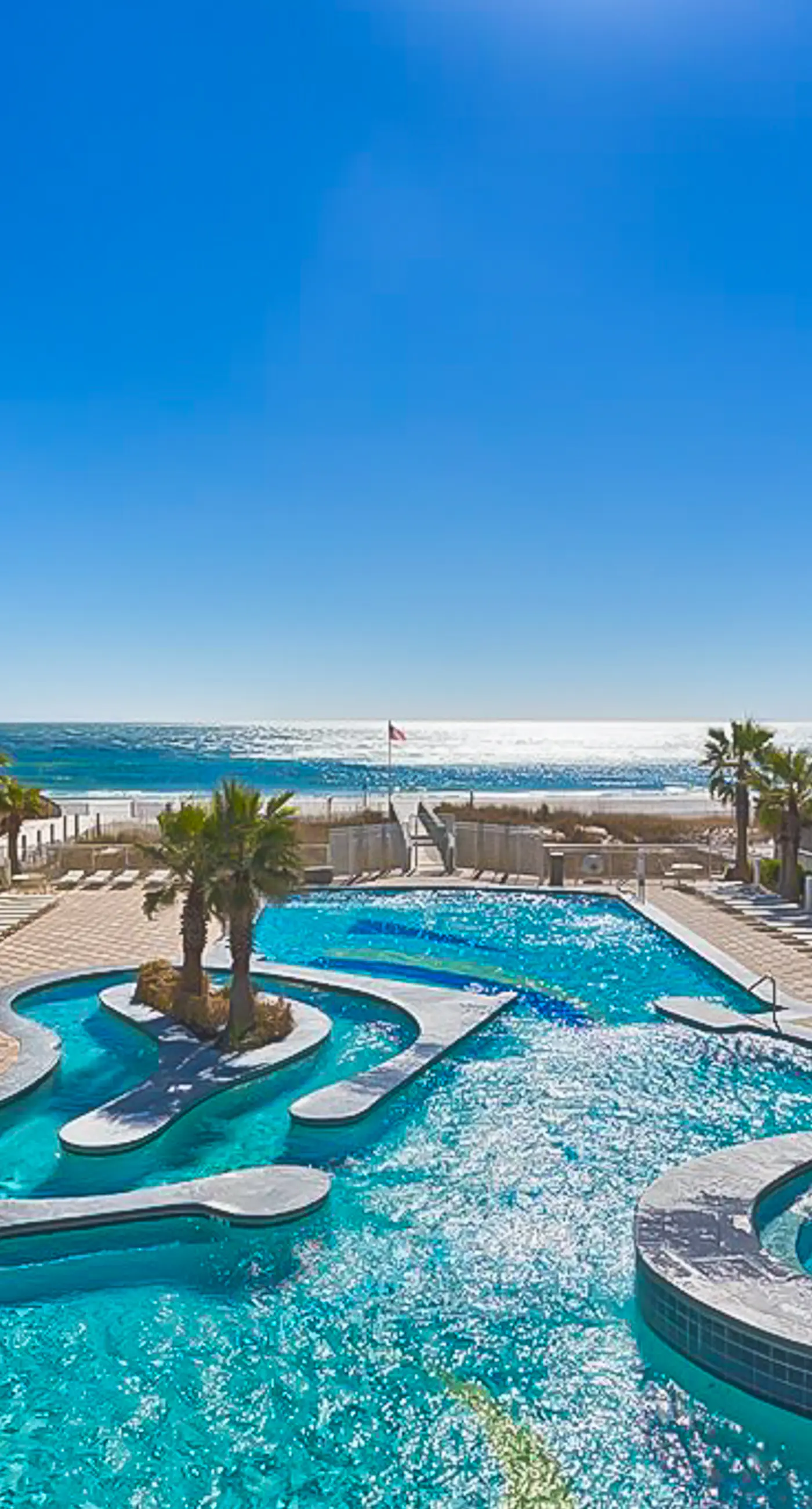 Wonderful coastal condo with pools, hot tubs, sauna & balcony