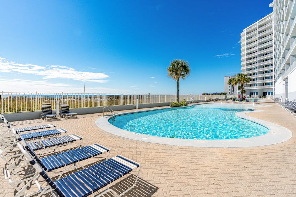 Oceanfront condo with sweeping views, washer/dryer, central AC, & access to pool