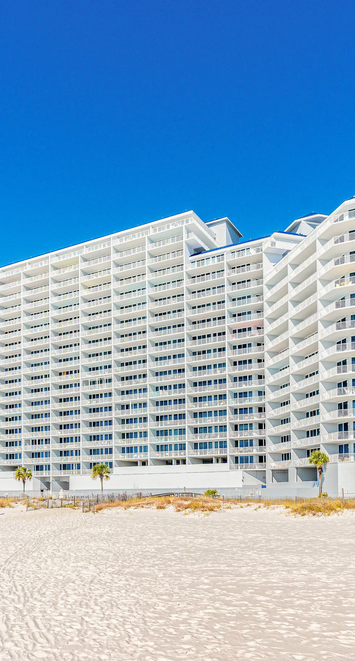 Oceanfront condo with sweeping views, washer/dryer, central AC, & access to pool