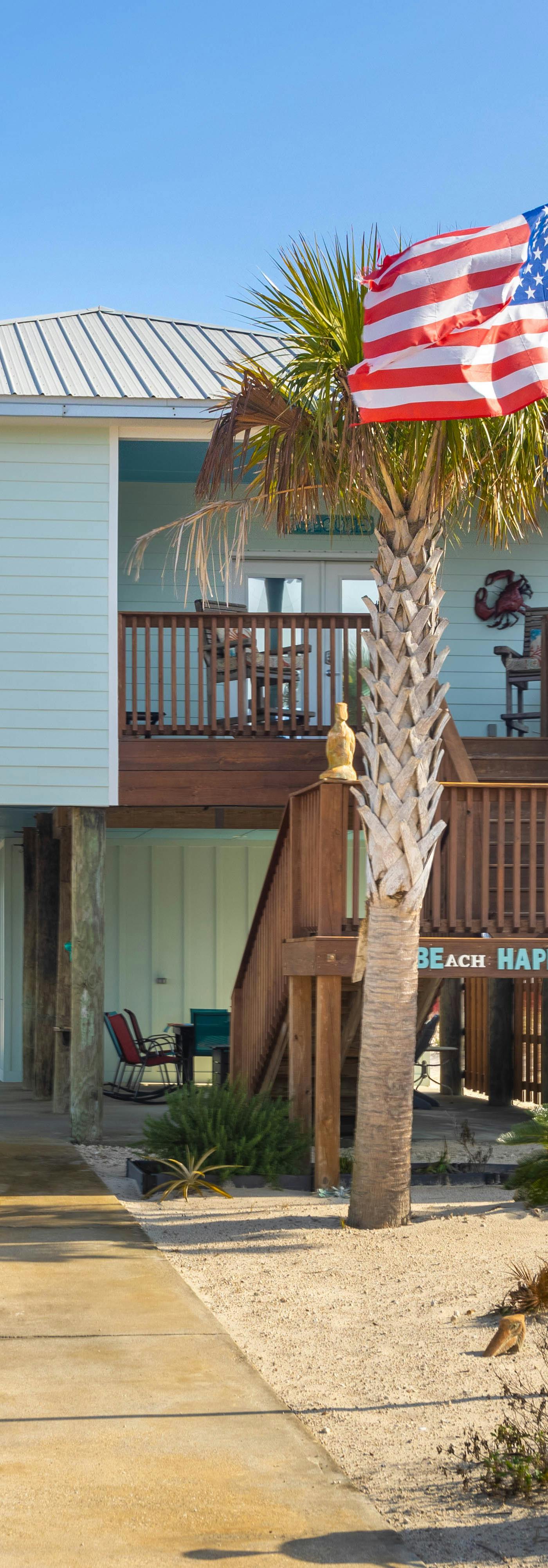 Pristine beach home with gulf view, covered patio, and AC