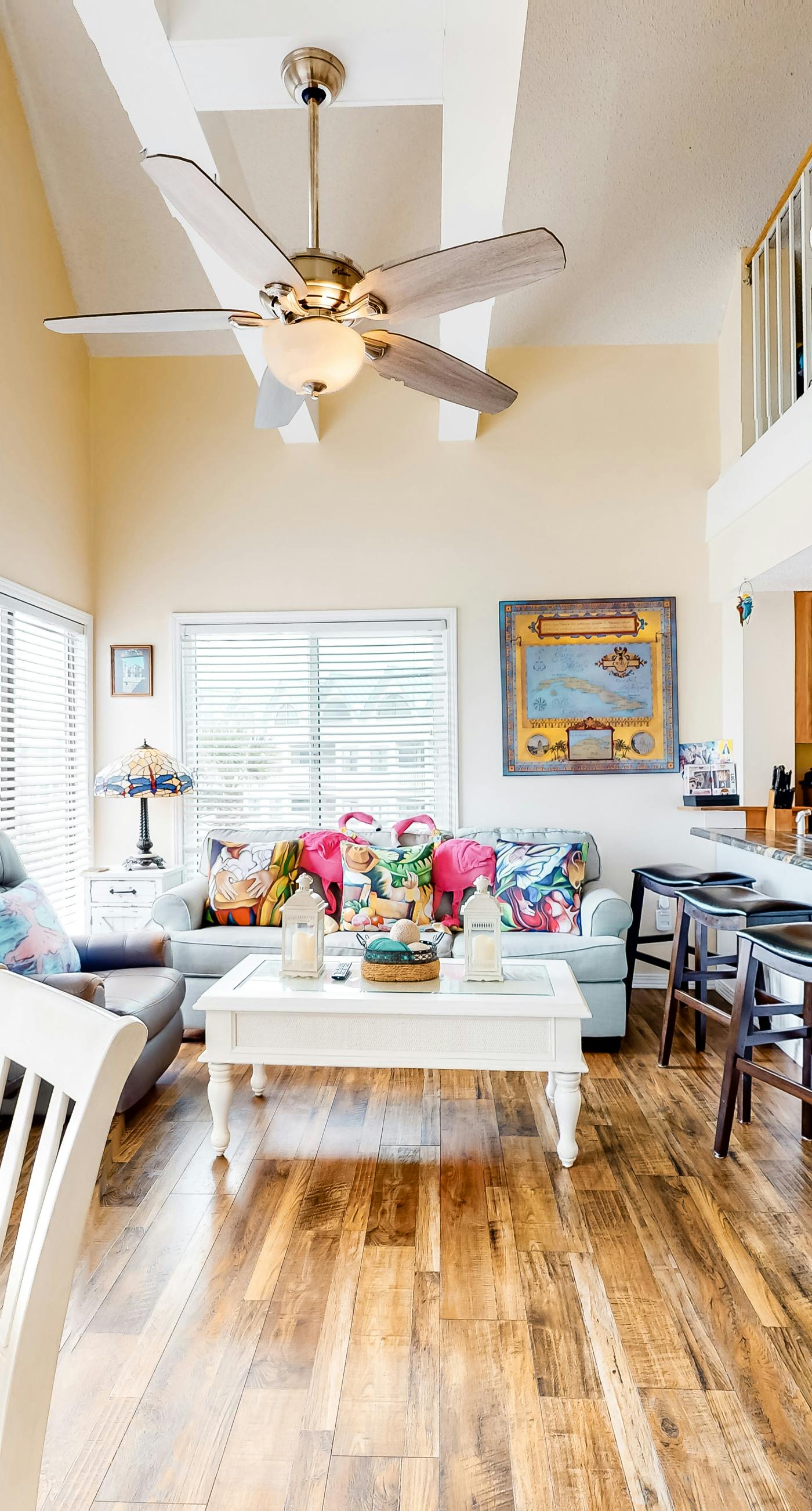 Colorful condo in beachfront complex with pools, gym, central AC & beach access