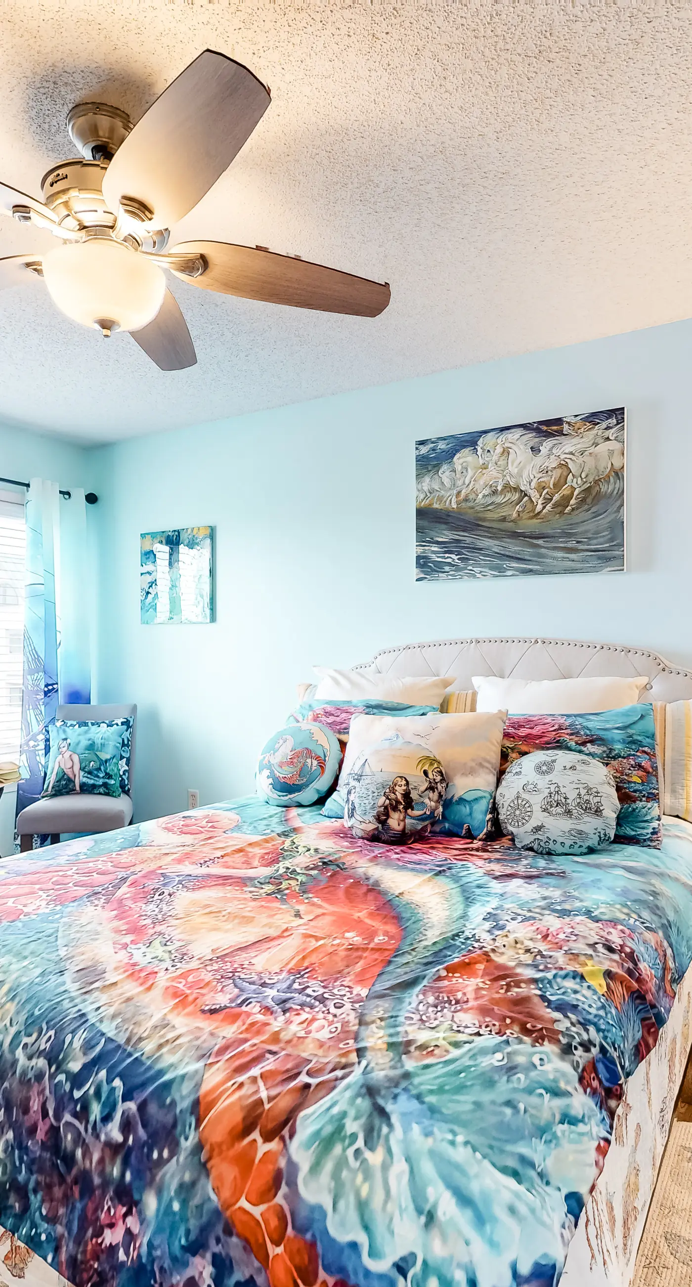 Colorful condo in beachfront complex with pools, gym, central AC & beach access