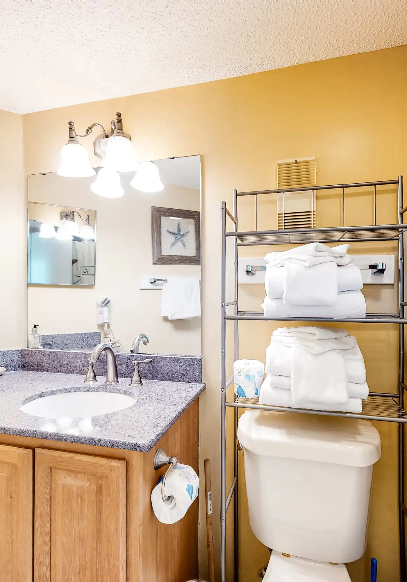 Colorful condo in beachfront complex with pools, gym, central AC & beach access