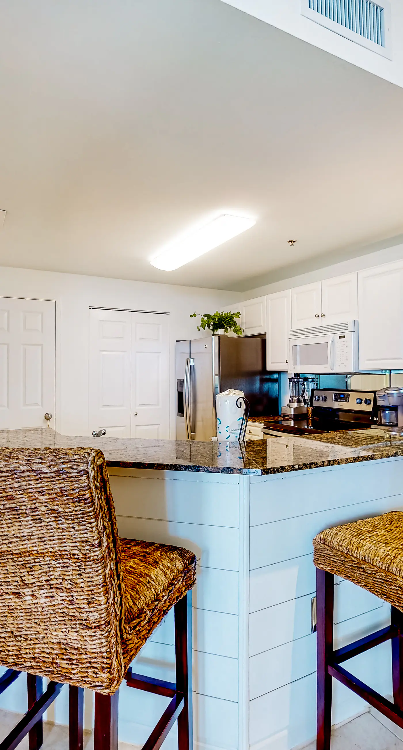 Peaceful water view condo with sauna, pool, tennis court, W&D, hot tub, & patio