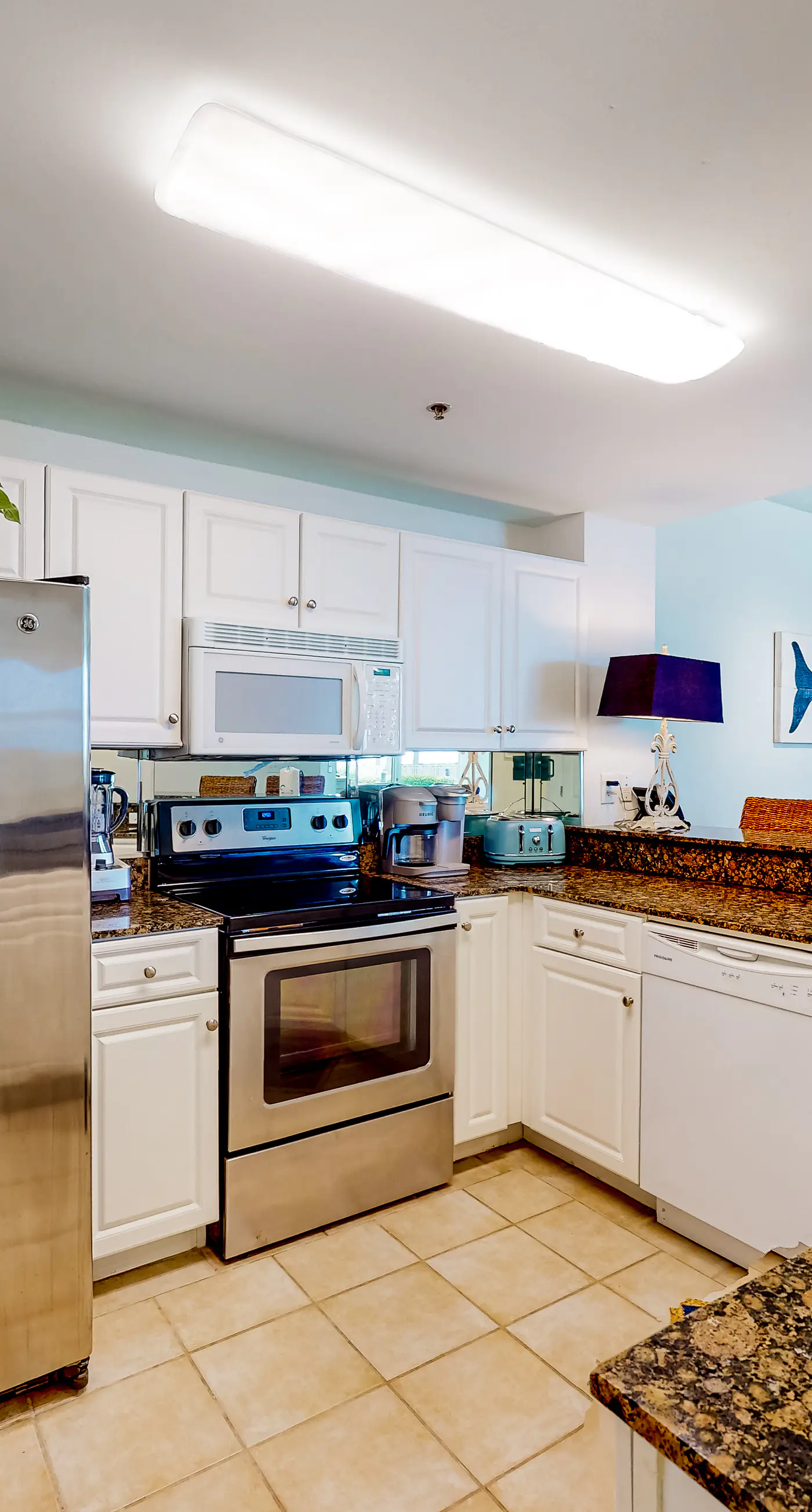 Peaceful water view condo with sauna, pool, tennis court, W&D, hot tub, & patio