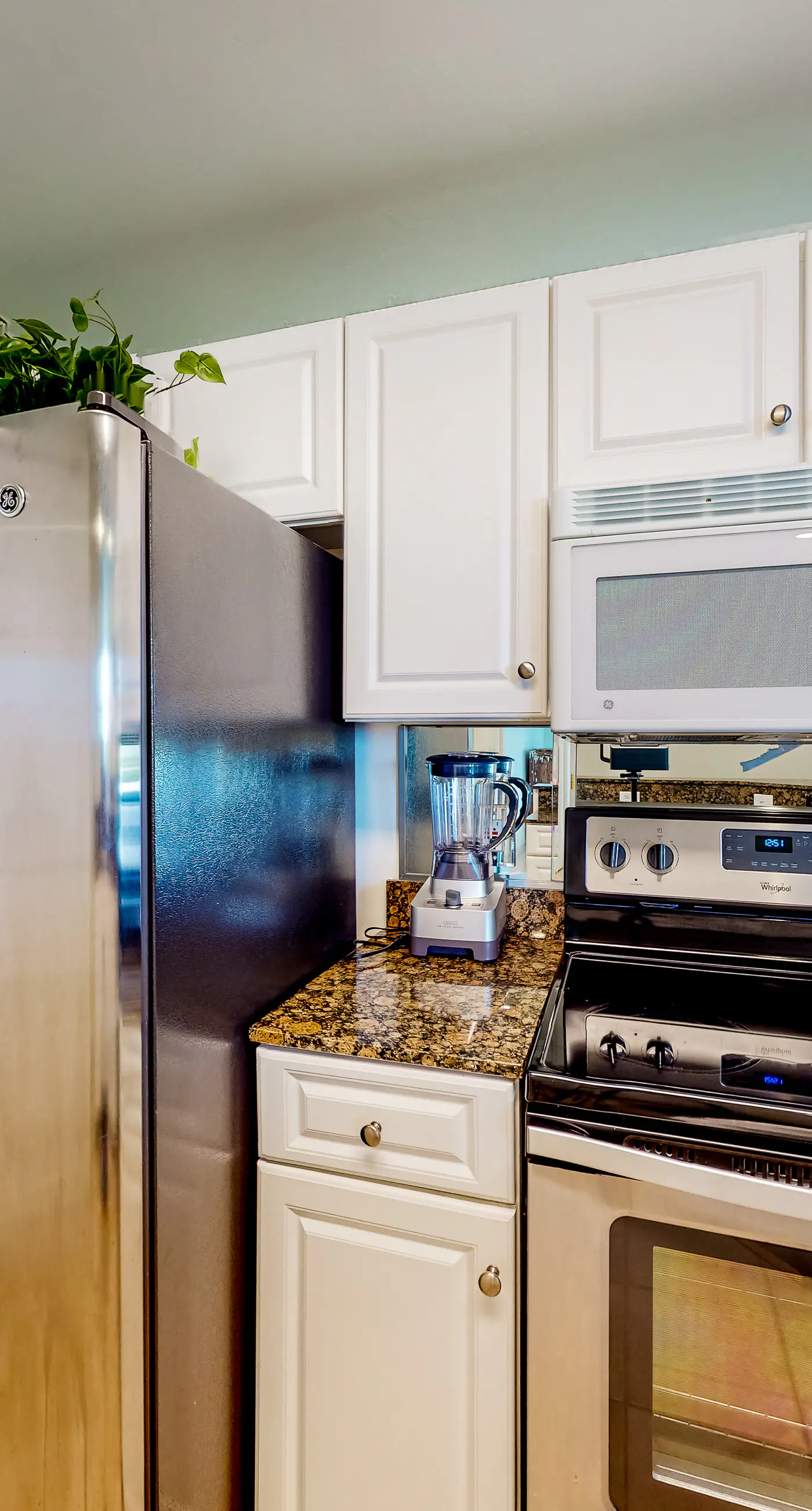 Peaceful water view condo with sauna, pool, tennis court, W&D, hot tub, & patio