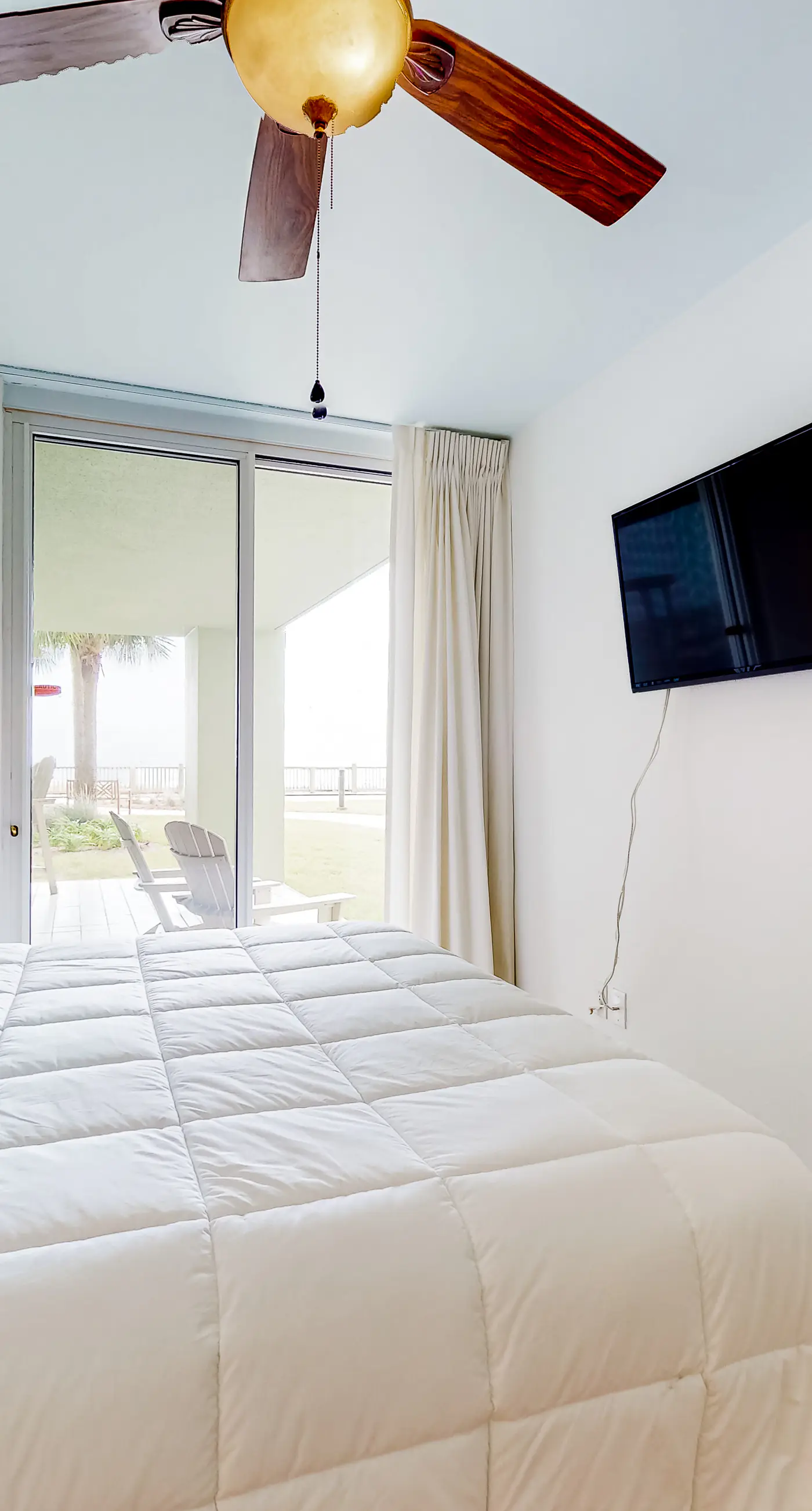 Peaceful water view condo with sauna, pool, tennis court, W&D, hot tub, & patio