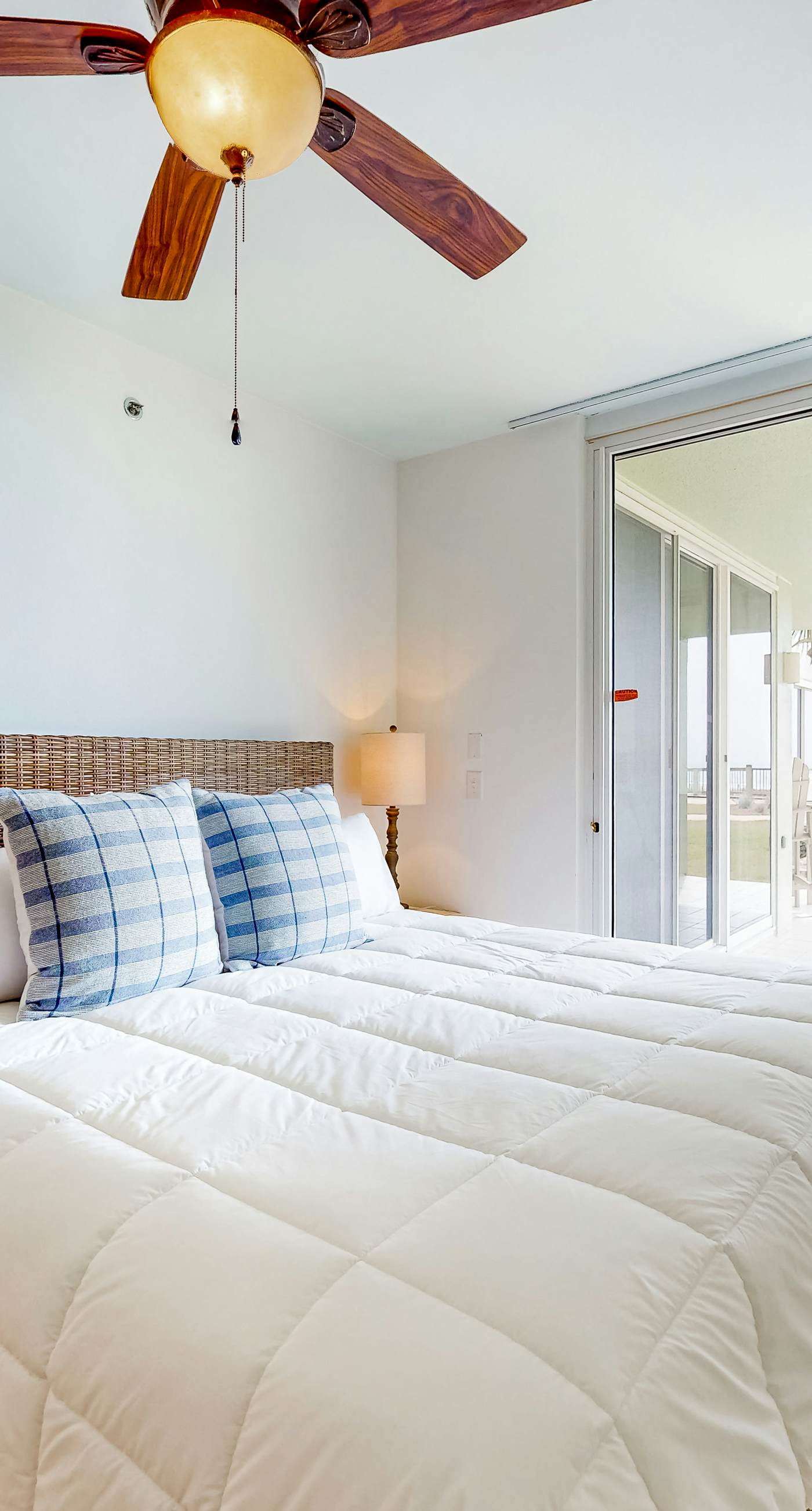 Peaceful water view condo with sauna, pool, tennis court, W&D, hot tub, & patio