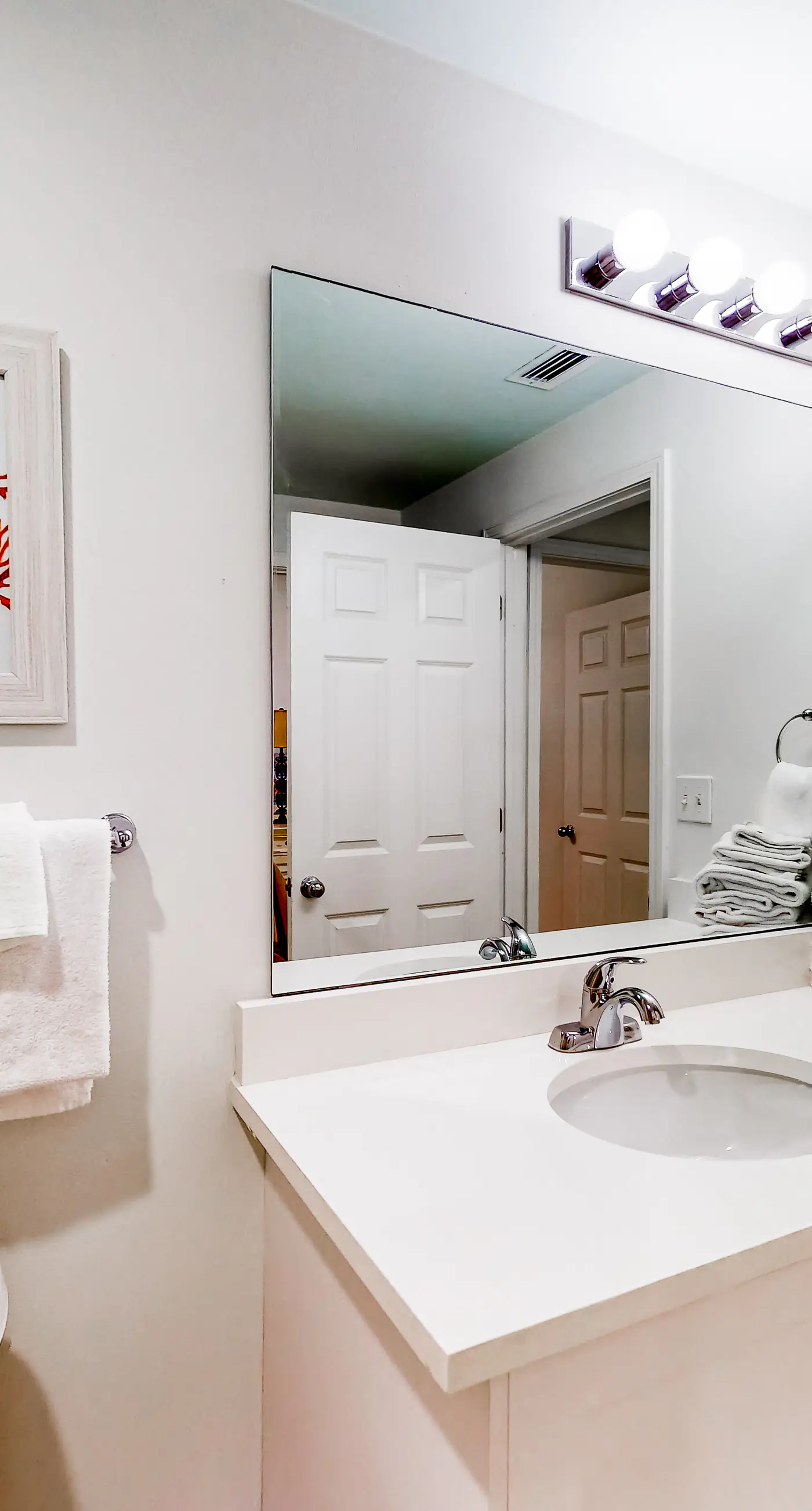 Peaceful water view condo with sauna, pool, tennis court, W&D, hot tub, & patio