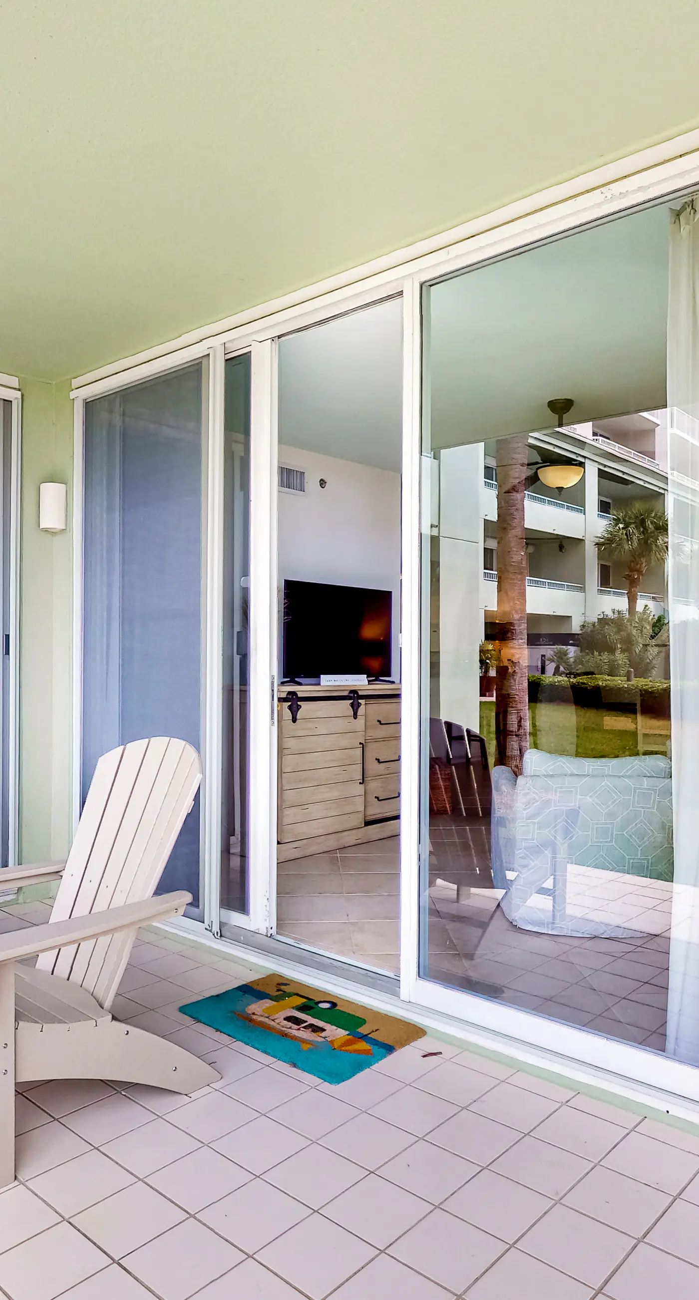 Peaceful water view condo with sauna, pool, tennis court, W&D, hot tub, & patio