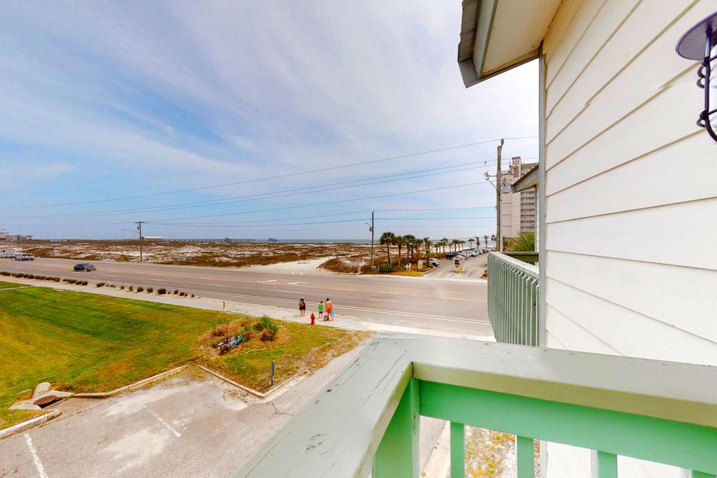 Renovated condo by the beach with pool access & private balconies