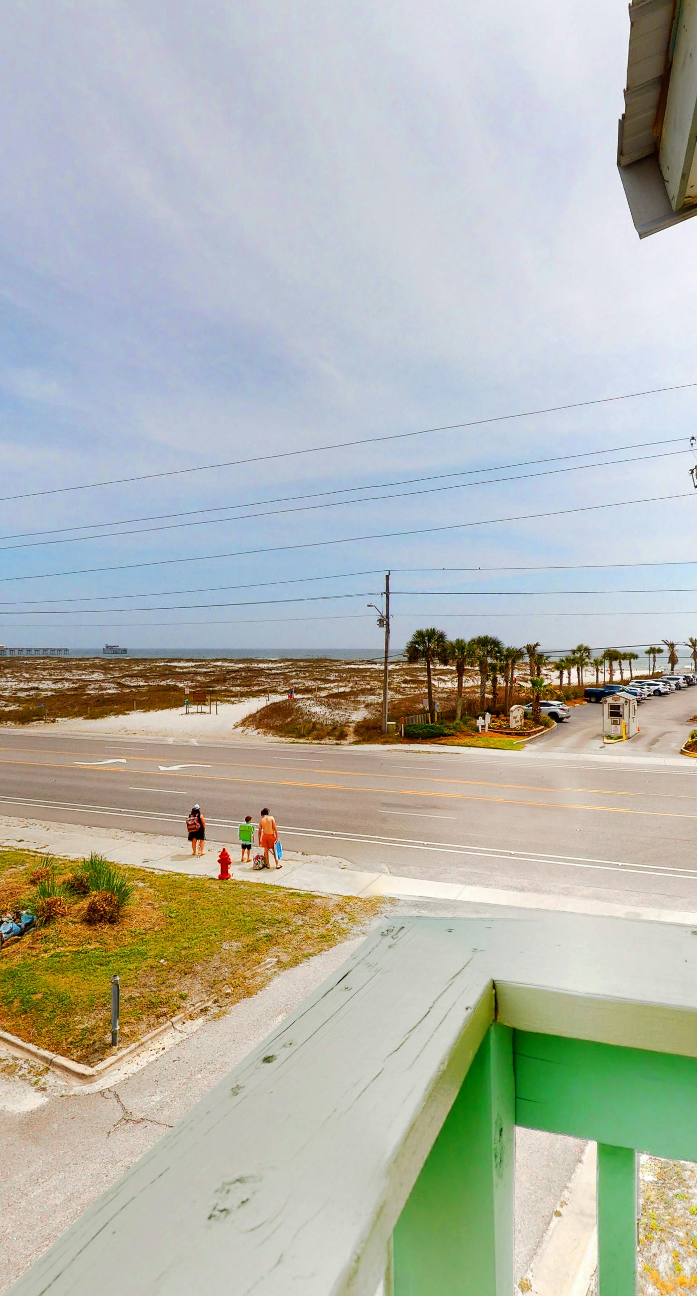 Renovated condo by the beach with pool access & private balconies