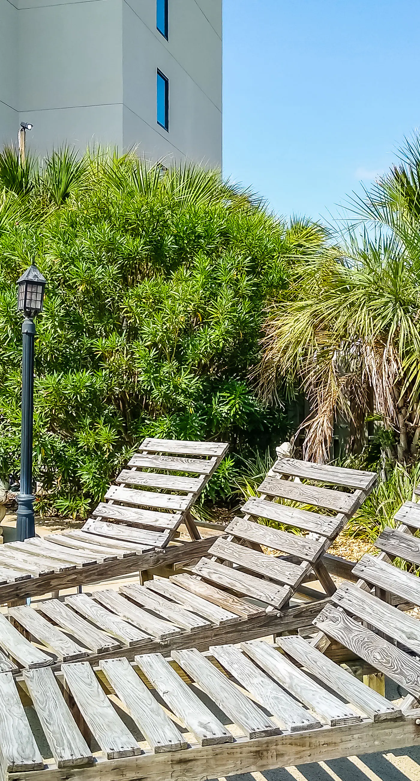 Renovated condo by the beach with pool access & private balconies