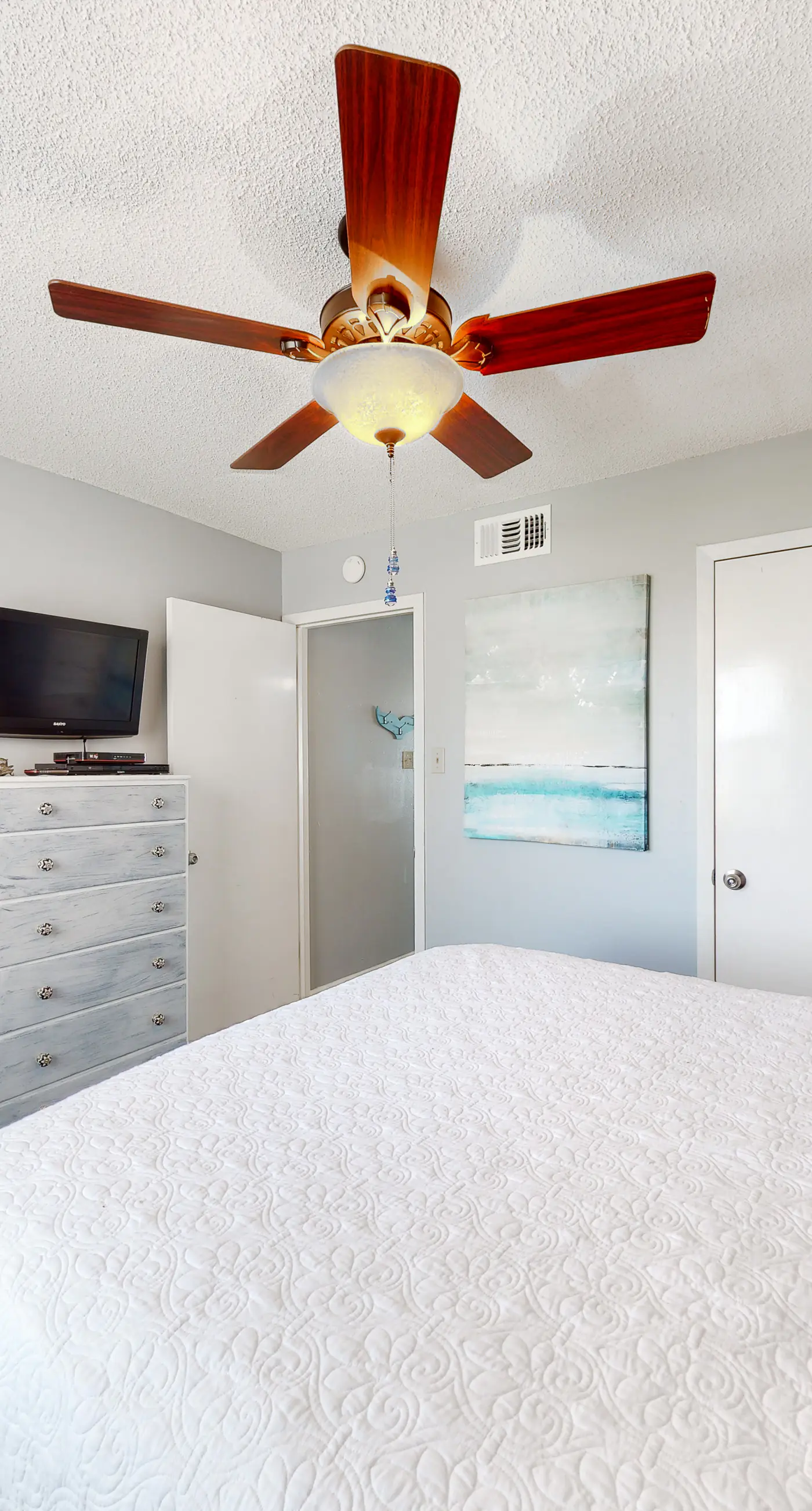 Renovated condo by the beach with pool access & private balconies