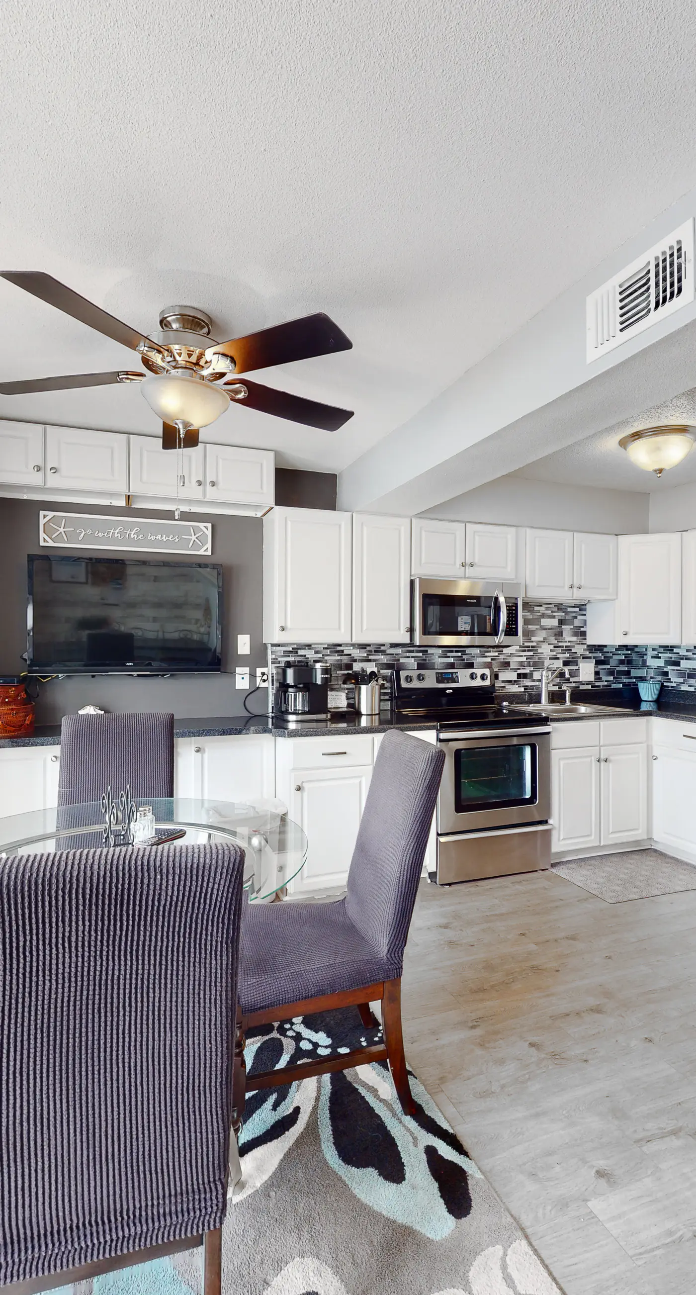 Renovated condo by the beach with pool access & private balconies