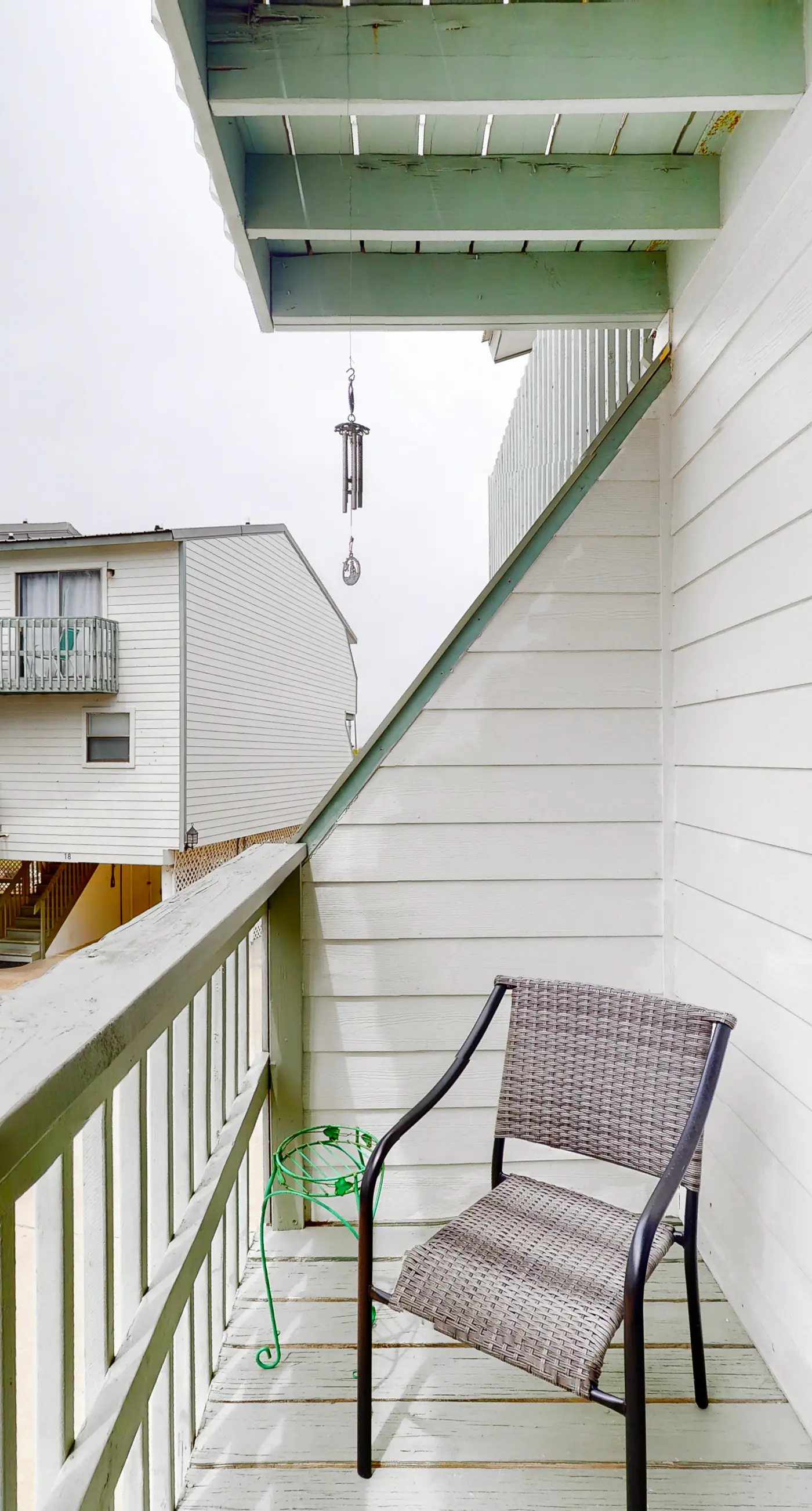 Renovated condo by the beach with pool access & private balconies