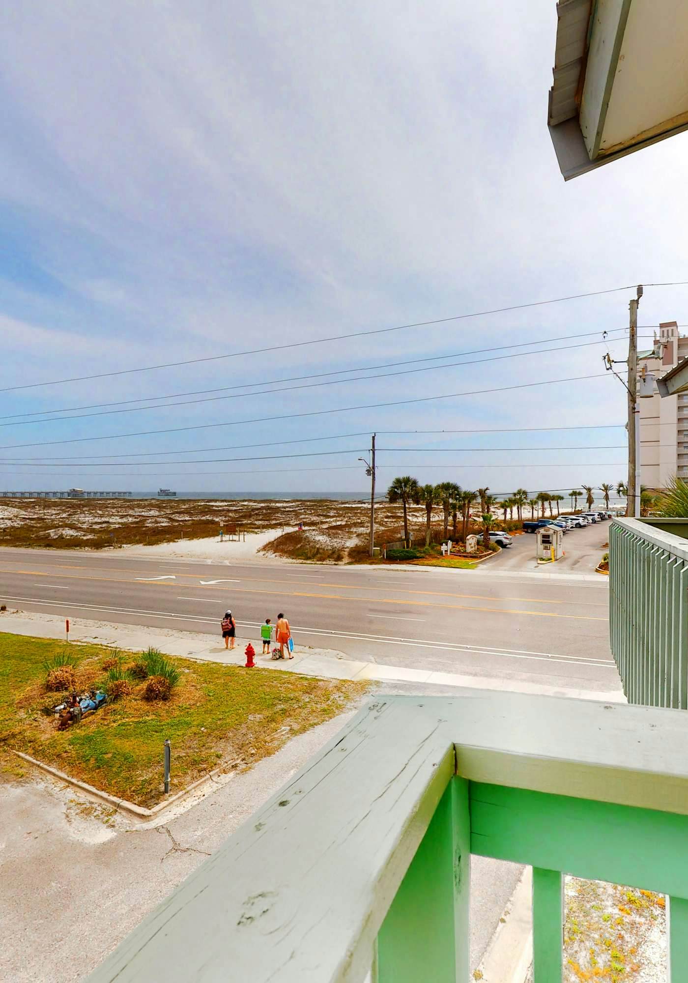 Renovated condo by the beach with pool access & private balconies