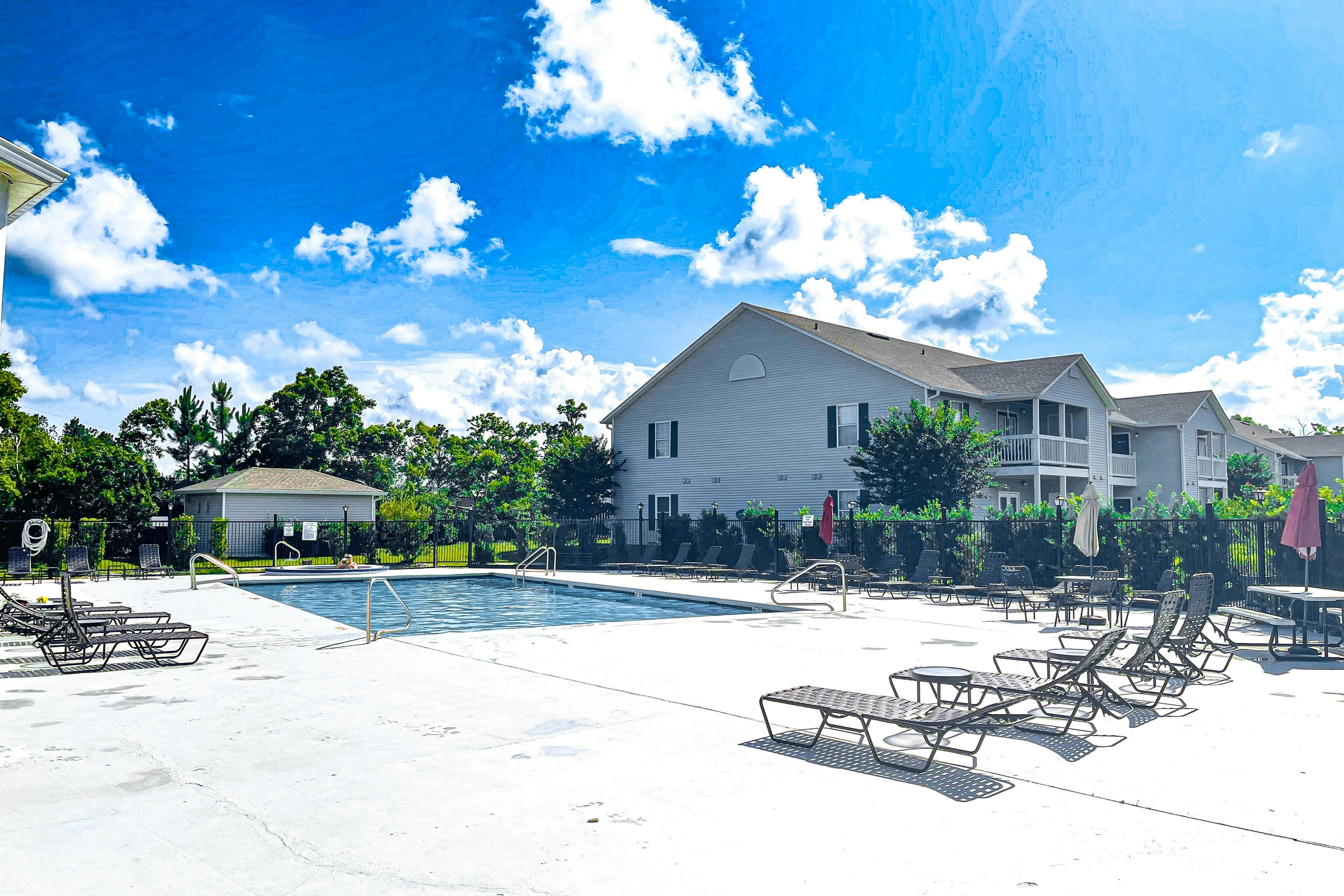 Updated condo with balcony, patio, hot tub, pool, washer,dryer, & full kitchen