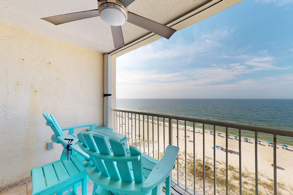 Inviting condo with ocean view, on-site pool, cozy balcony, washer/dryer & AC
