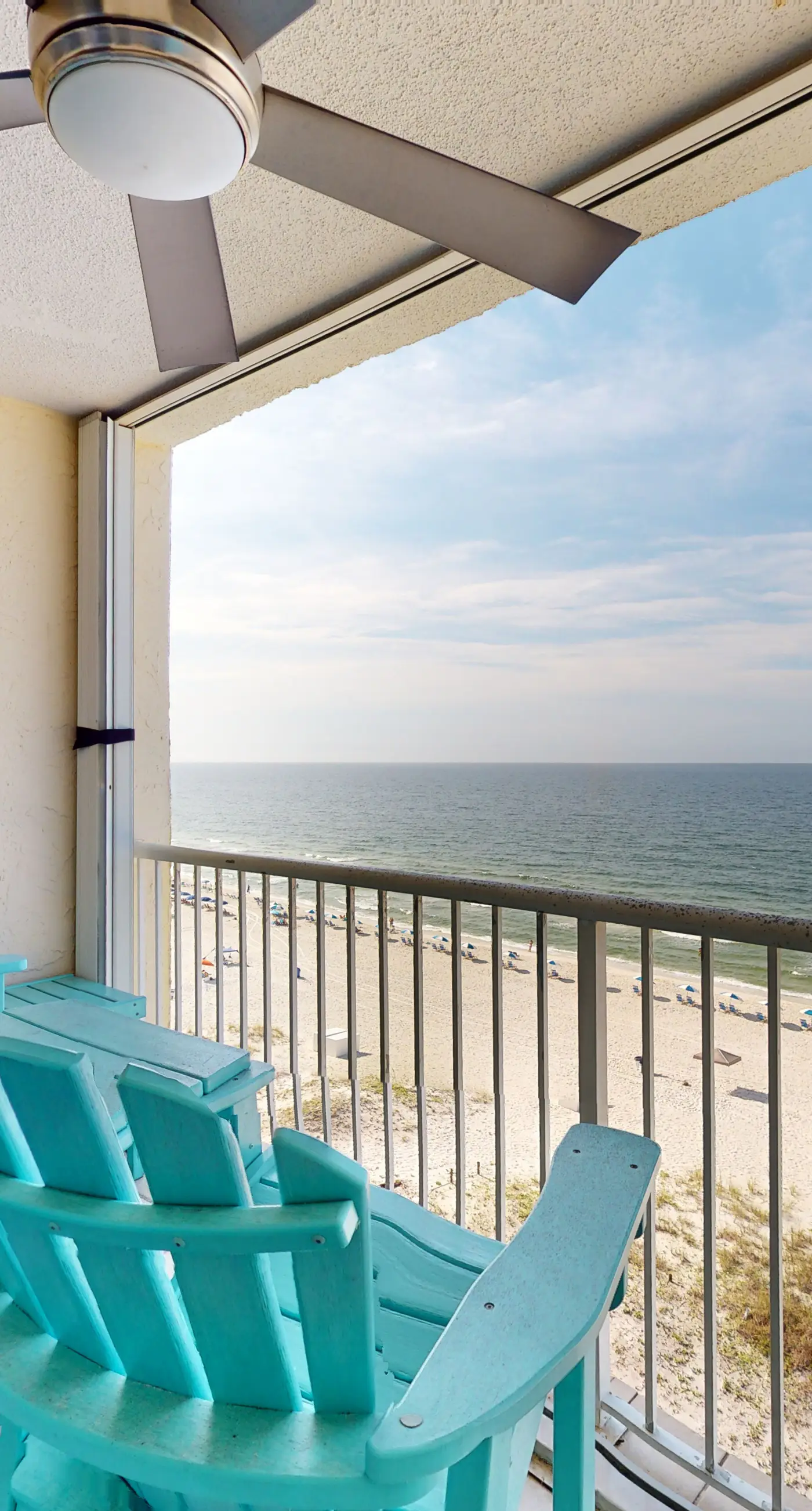 Inviting condo with ocean view, on-site pool, cozy balcony, washer/dryer & AC