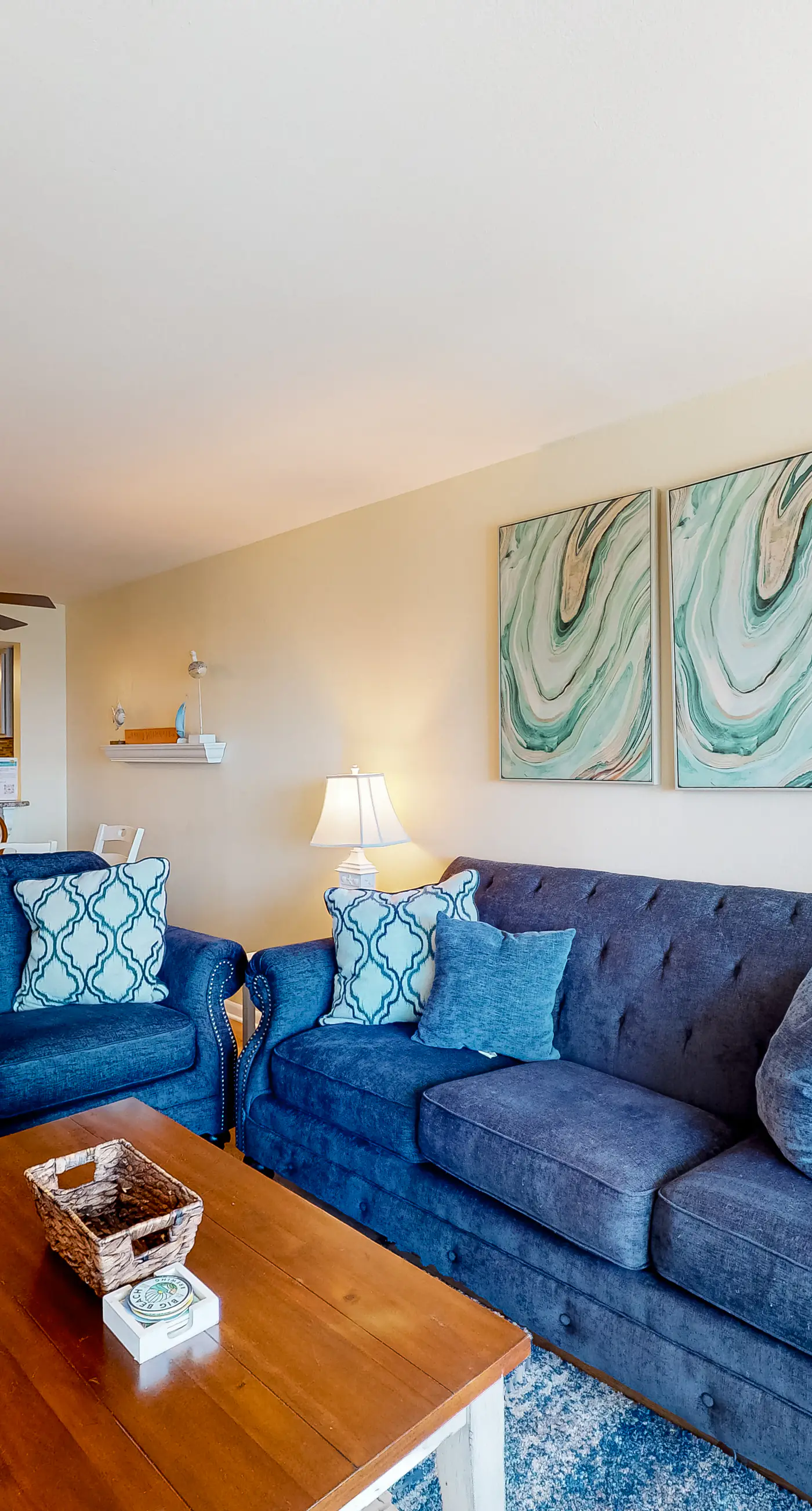 Inviting condo with ocean view, on-site pool, cozy balcony, washer/dryer & AC