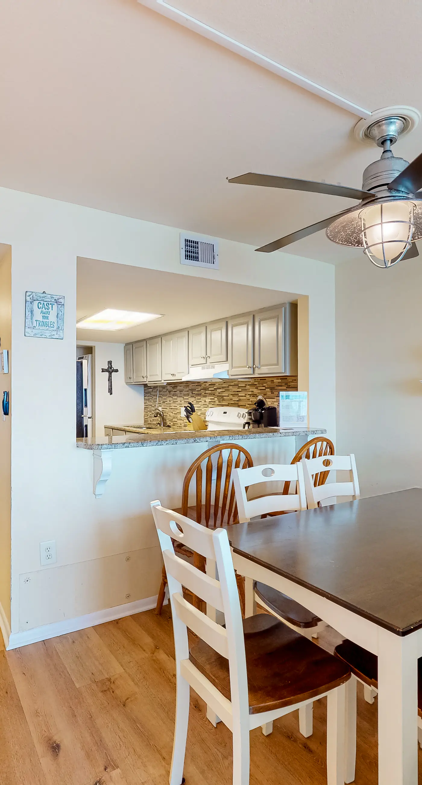 Inviting condo with ocean view, on-site pool, cozy balcony, washer/dryer & AC