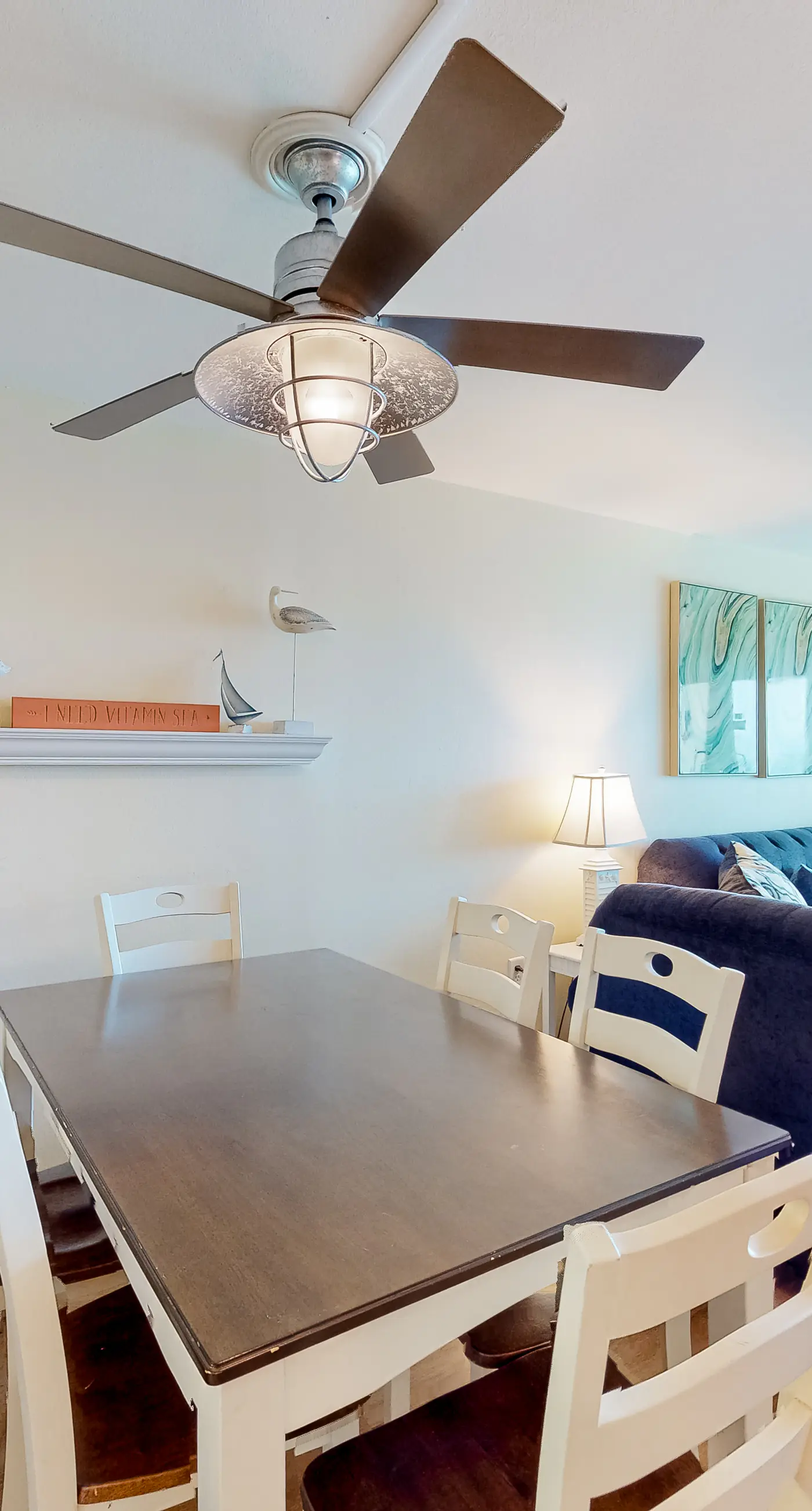 Inviting condo with ocean view, on-site pool, cozy balcony, washer/dryer & AC