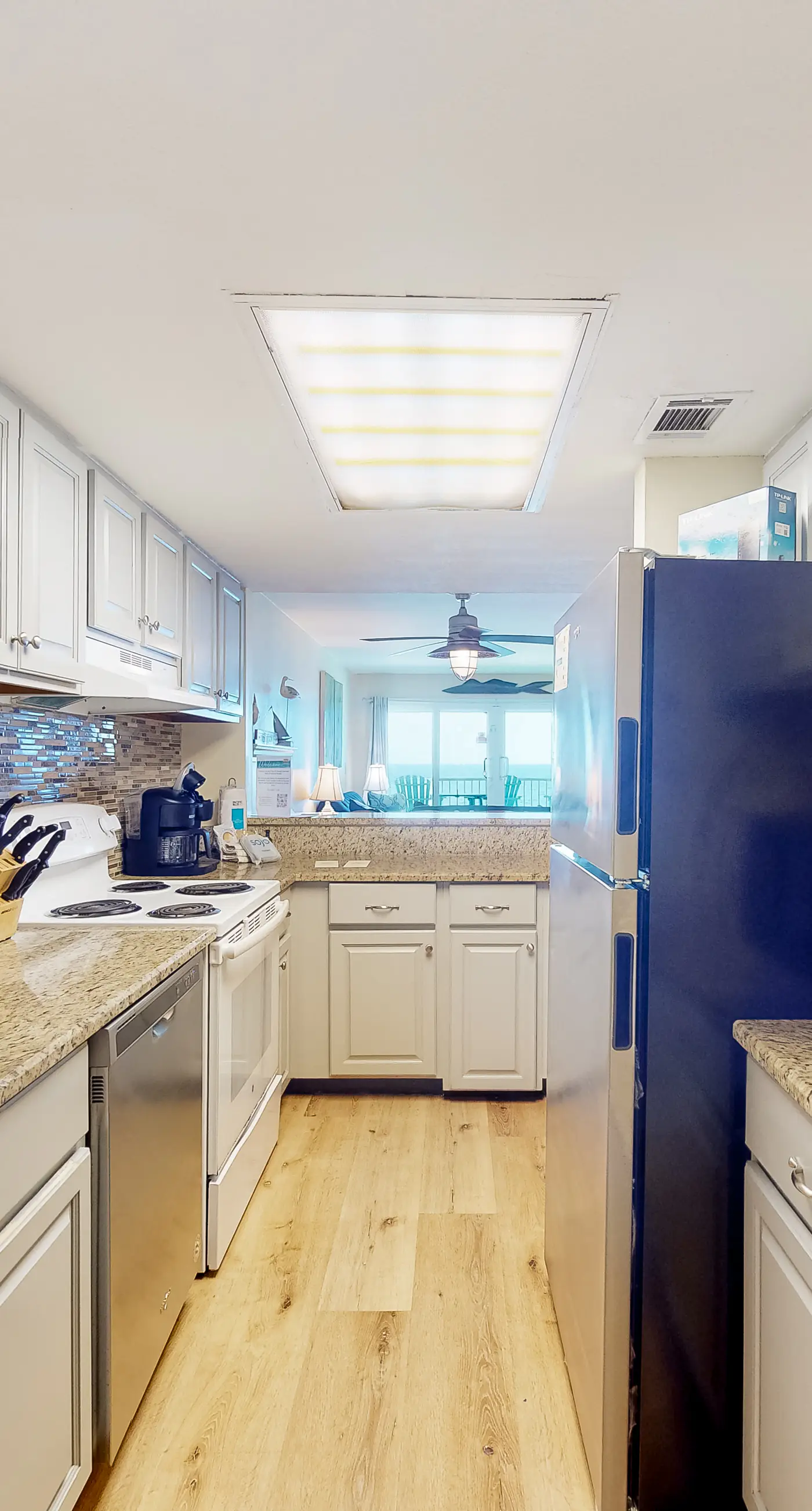 Inviting condo with ocean view, on-site pool, cozy balcony, washer/dryer & AC