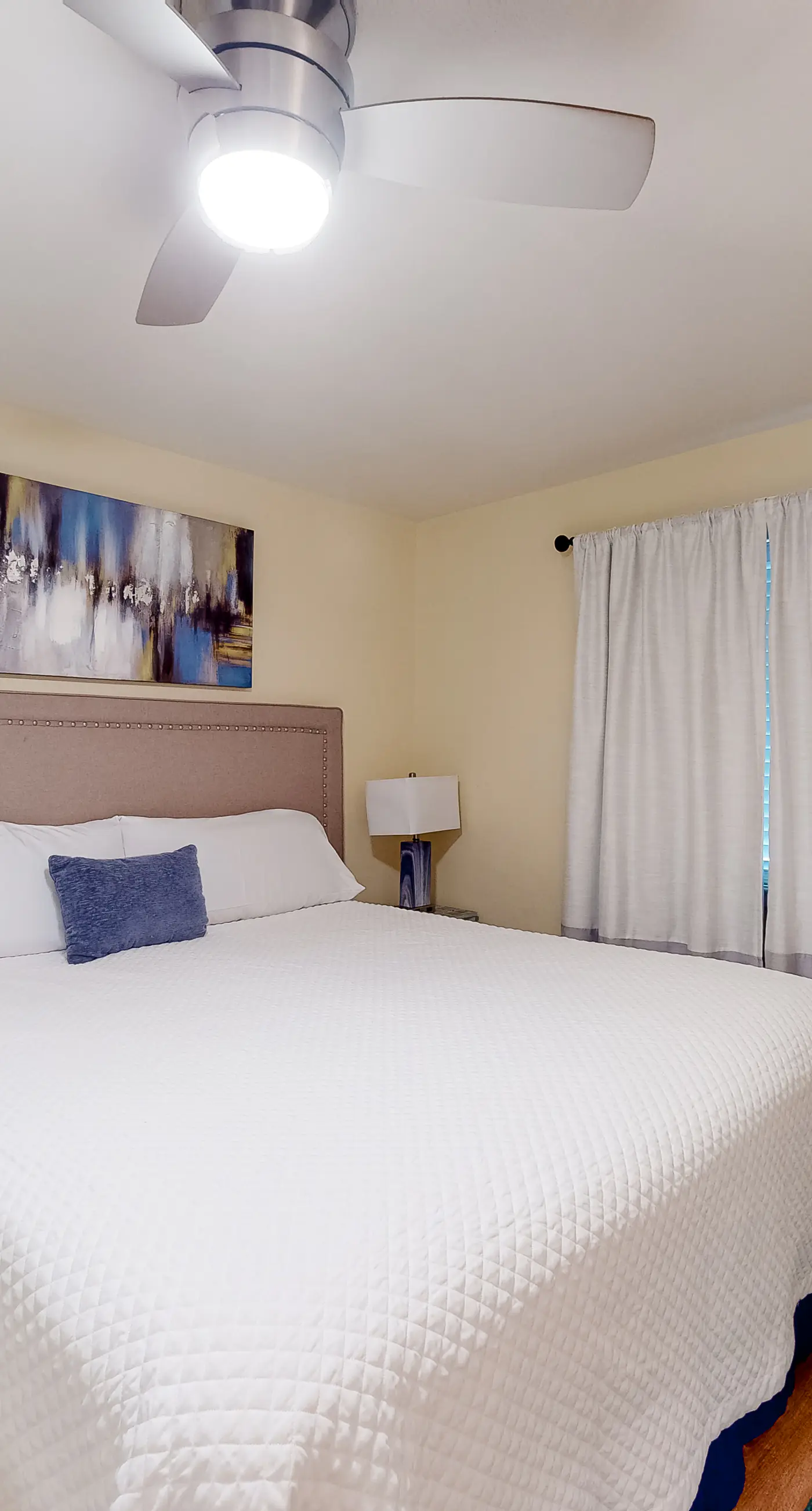 Inviting condo with ocean view, on-site pool, cozy balcony, washer/dryer & AC