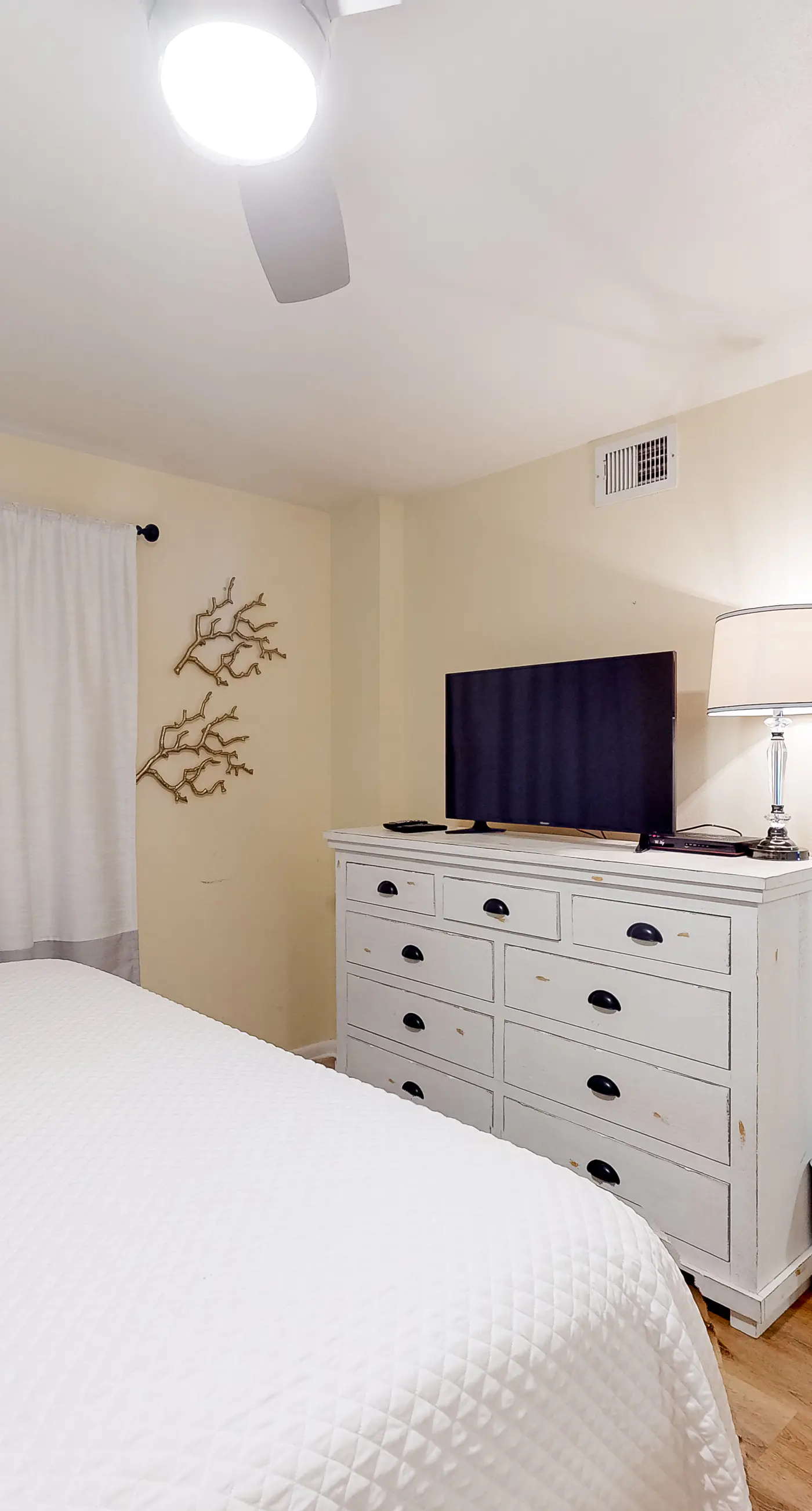 Inviting condo with ocean view, on-site pool, cozy balcony, washer/dryer & AC