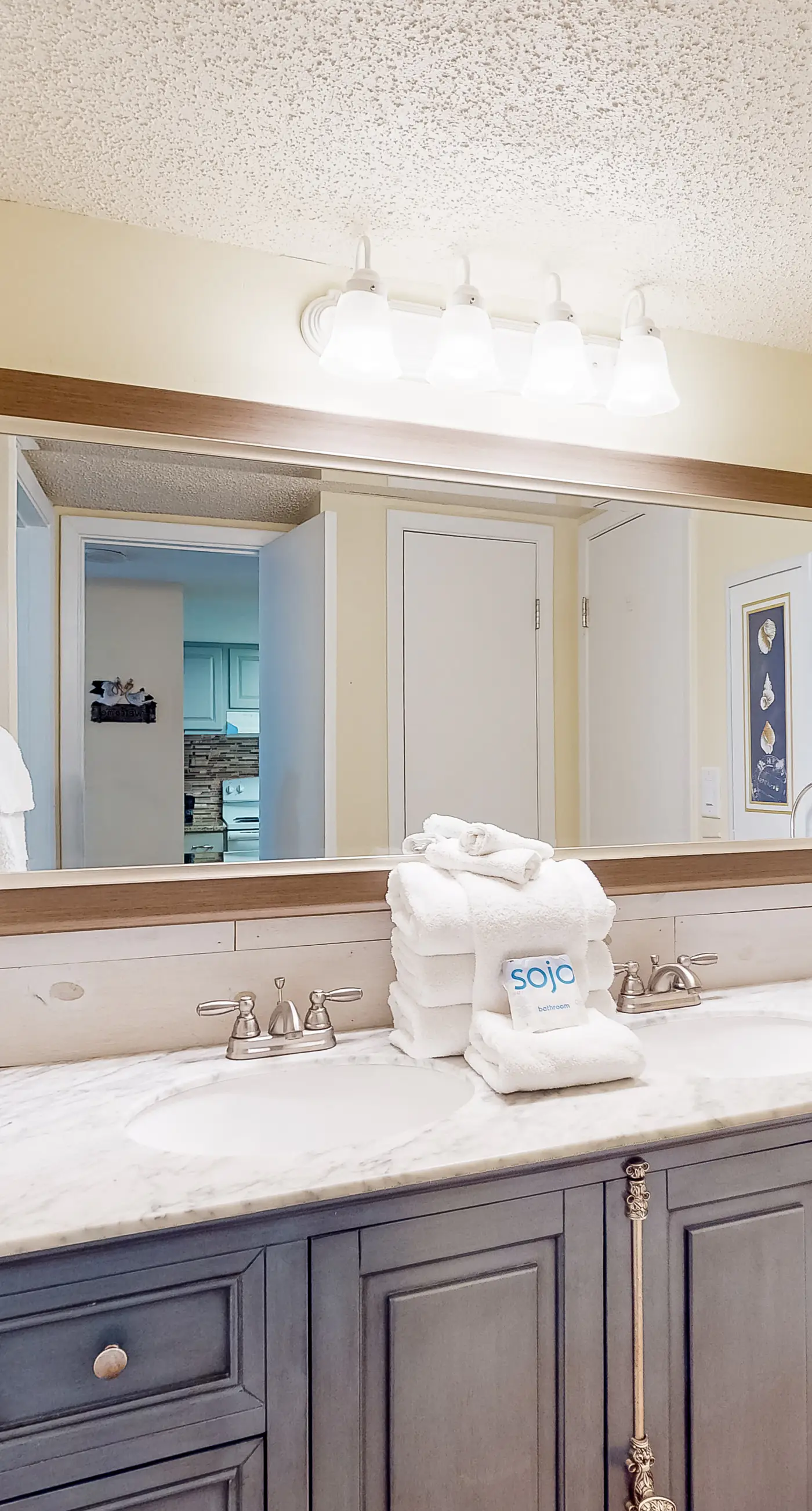 Inviting condo with ocean view, on-site pool, cozy balcony, washer/dryer & AC