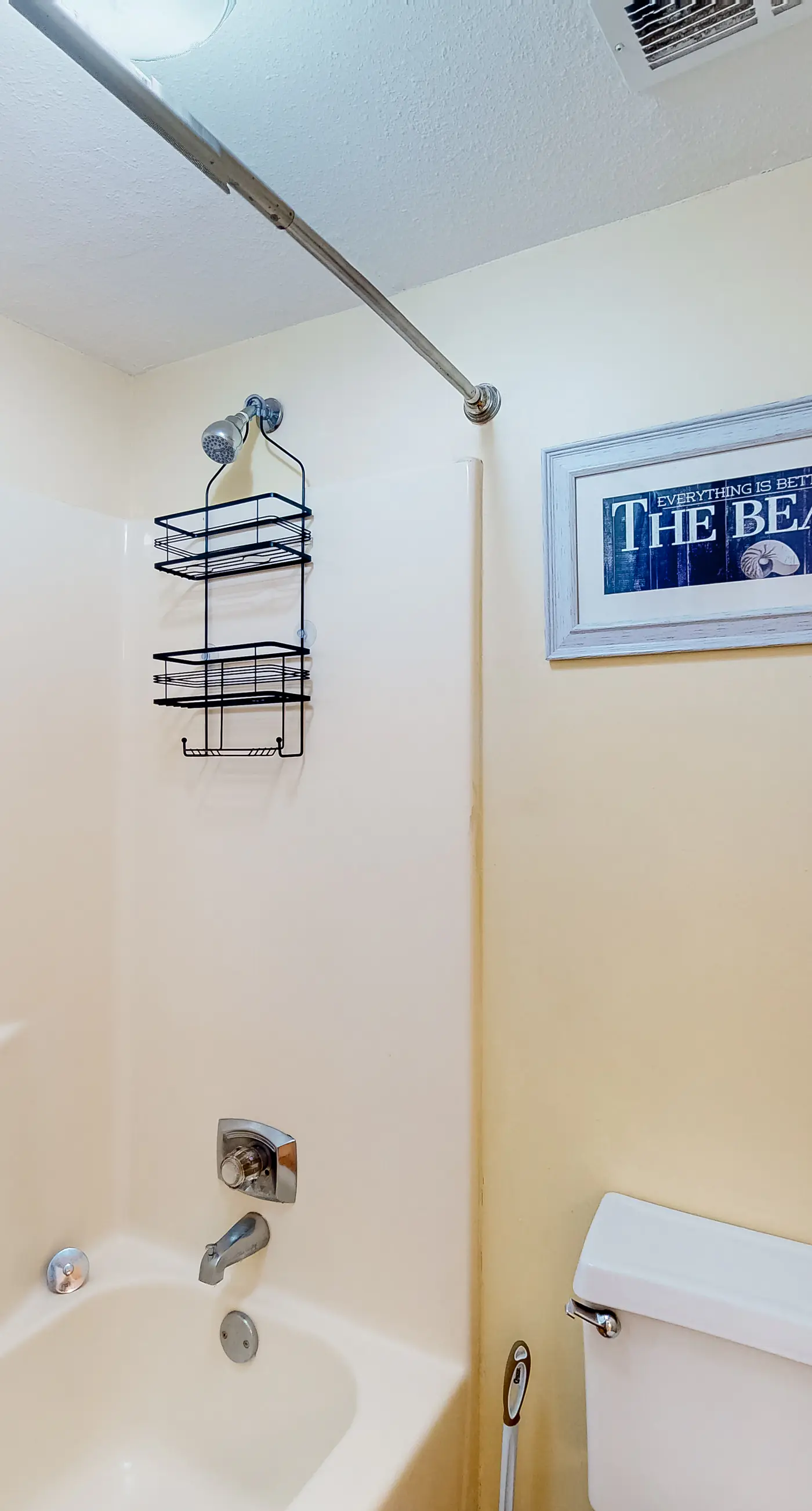 Inviting condo with ocean view, on-site pool, cozy balcony, washer/dryer & AC