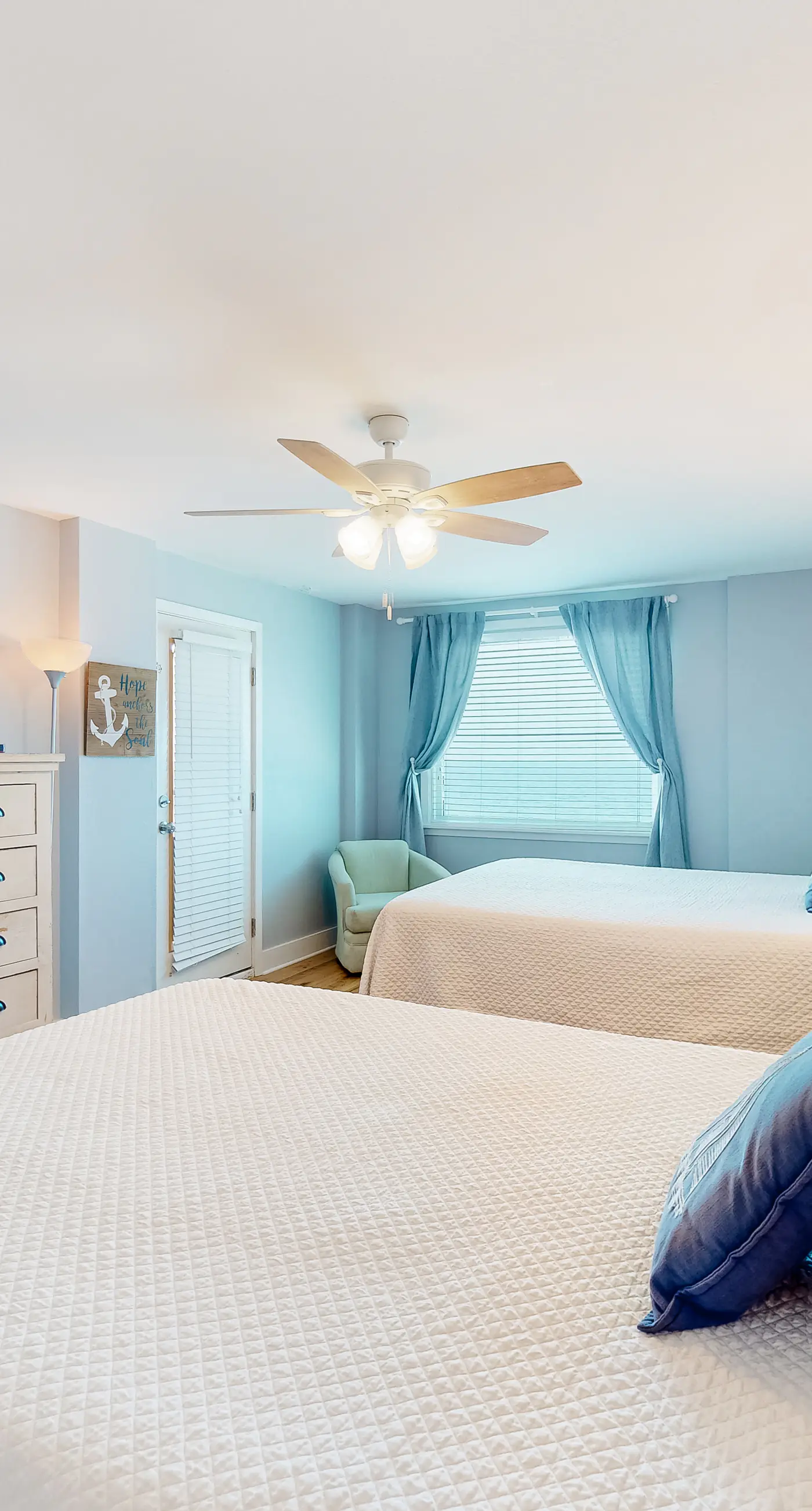 Inviting condo with ocean view, on-site pool, cozy balcony, washer/dryer & AC