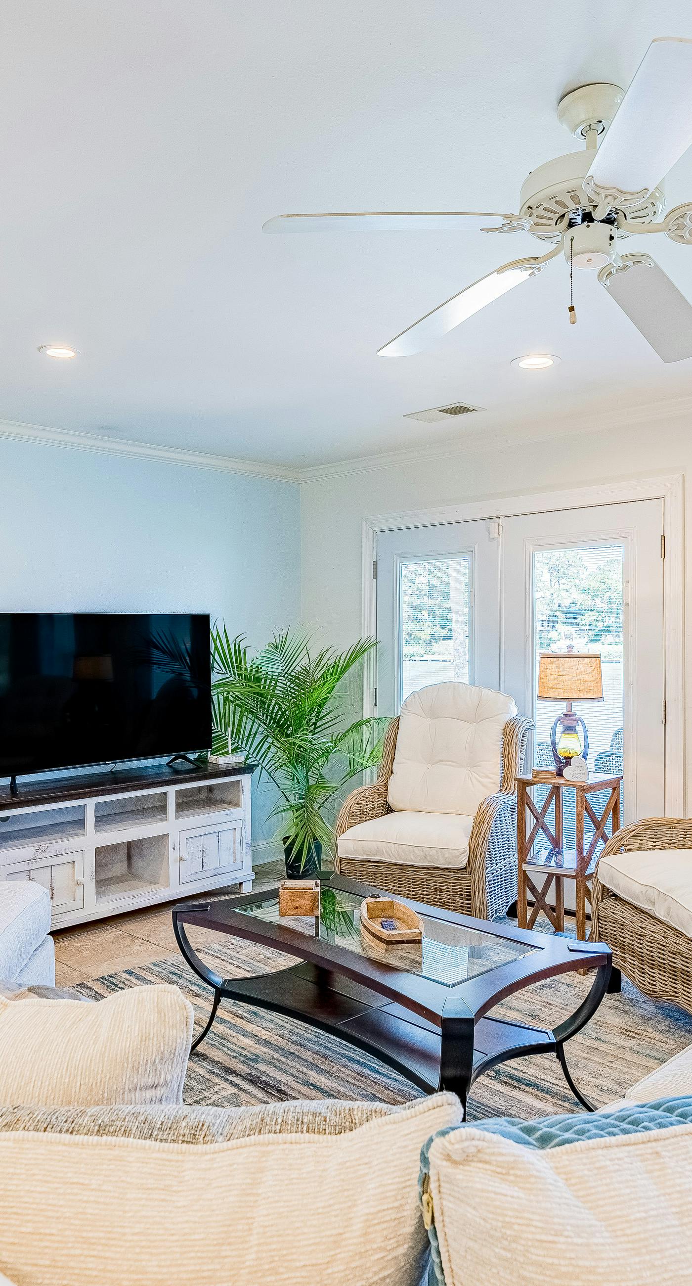 Bayfront beauty with a pool, grill, dock, reading room, board games, & AC