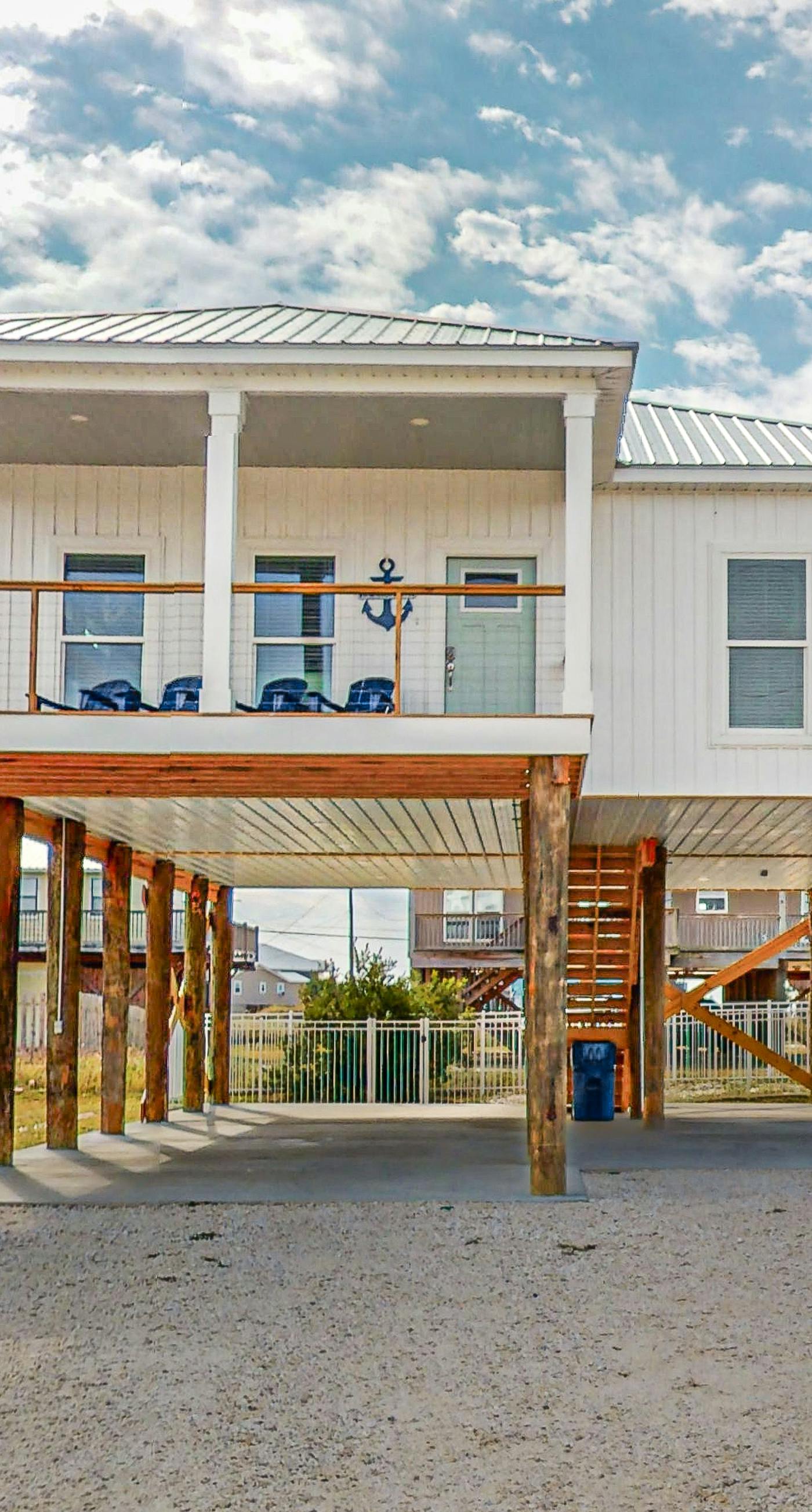 Coastal dog-friendly home with grill, balcony, & patio - short walk to the beach