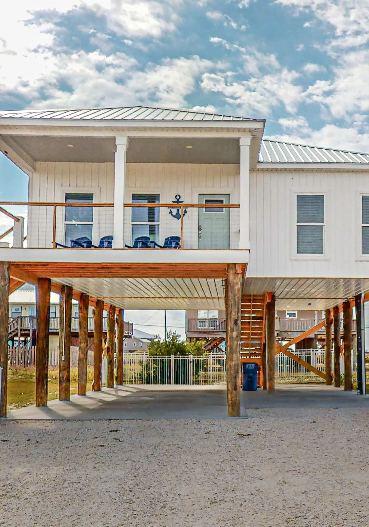 Coastal dog-friendly home with grill, balcony, & patio - short walk to the beach