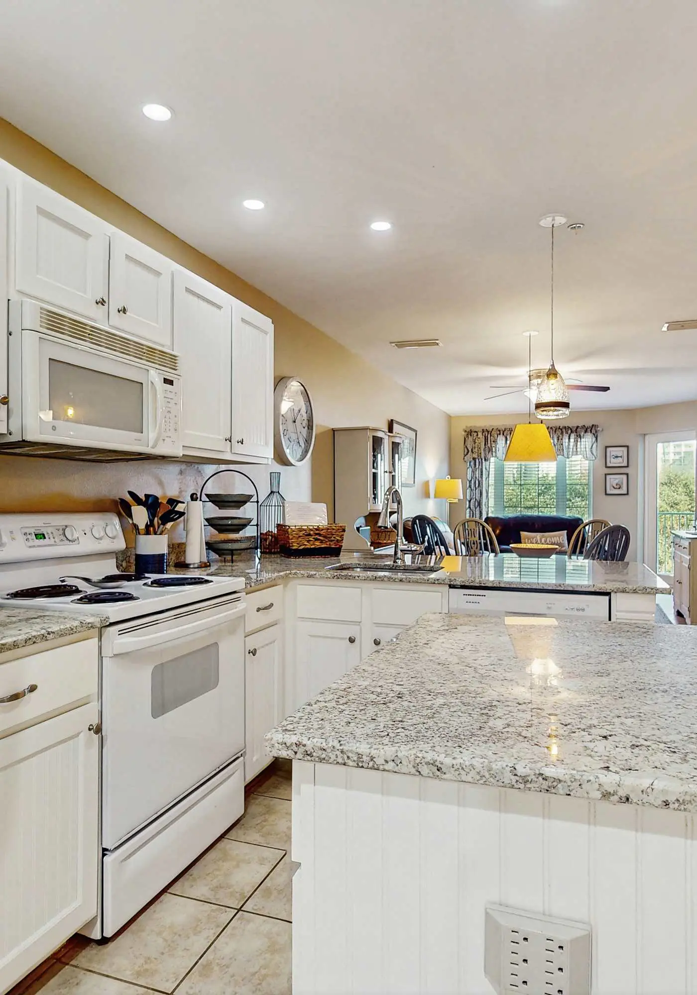 Beach resort condo with patio, central AC, WiFi, on-site pool, & beach access